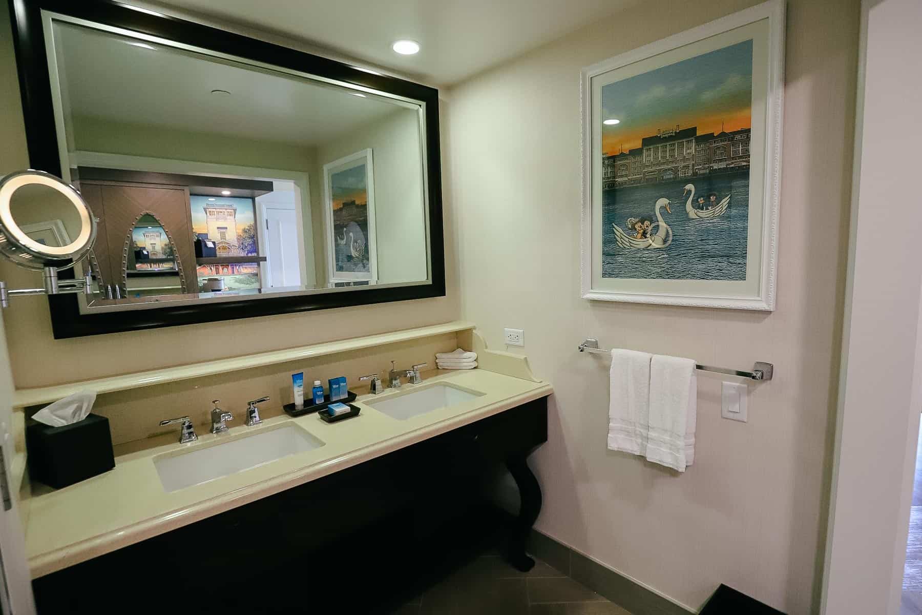 a vanity with two sinks in Disney Boardwalk Inn guest room