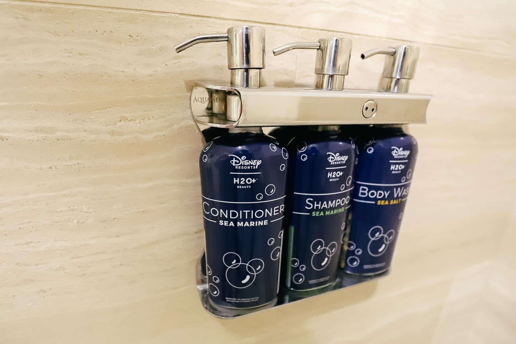 shampoo, conditioner, and body wash dispensers in the shower at Disney's Boardwalk