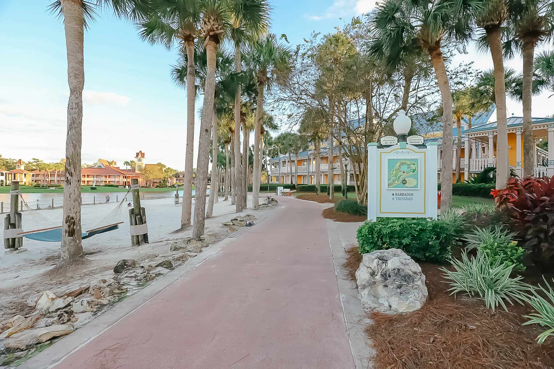 the walkway between Barefoot Bay and Jamaica with a directional sign 