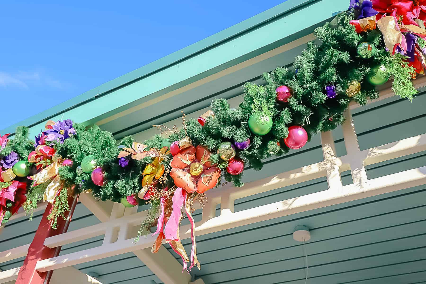 Close up that shows the details of the Christmas garland at Disney's Caribbean Beach Resort. 