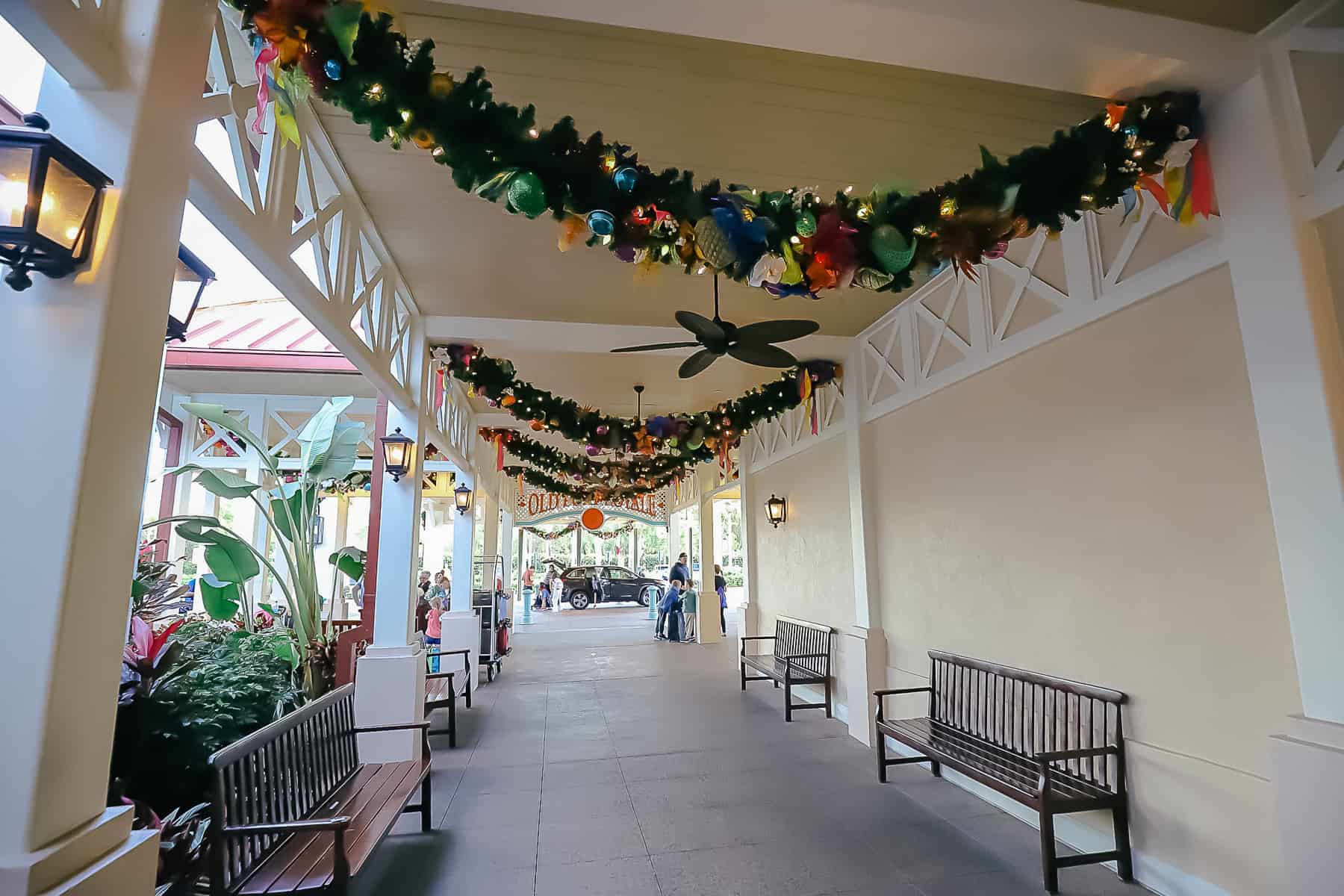 The Christmas garland swags every few feet near the entrance. 