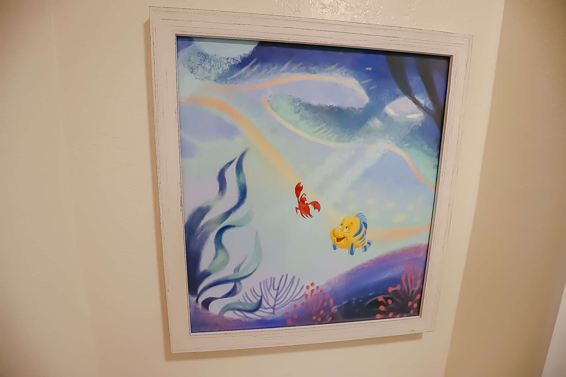 artwork featuring Sebastian and Flounder 