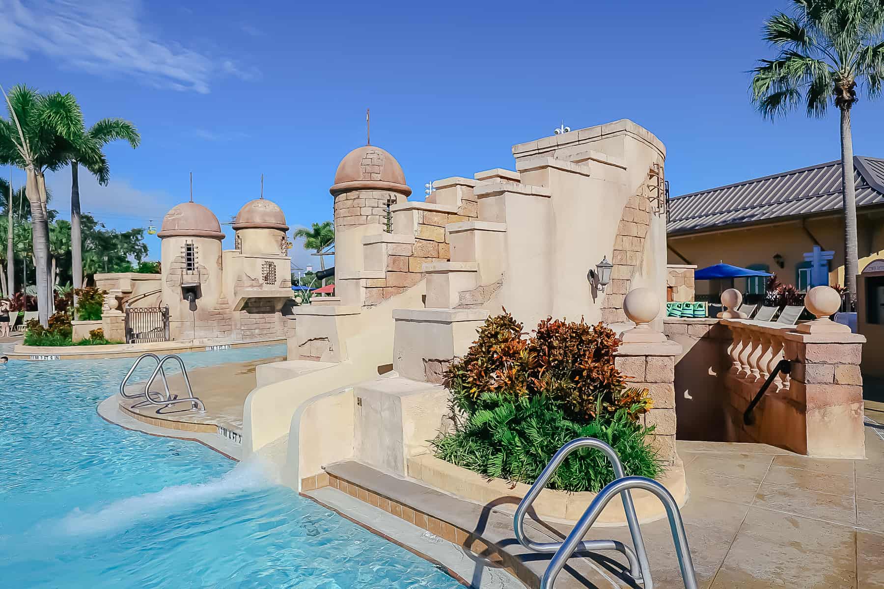 shows the smaller slide at the Caribbean Beach feature pool 