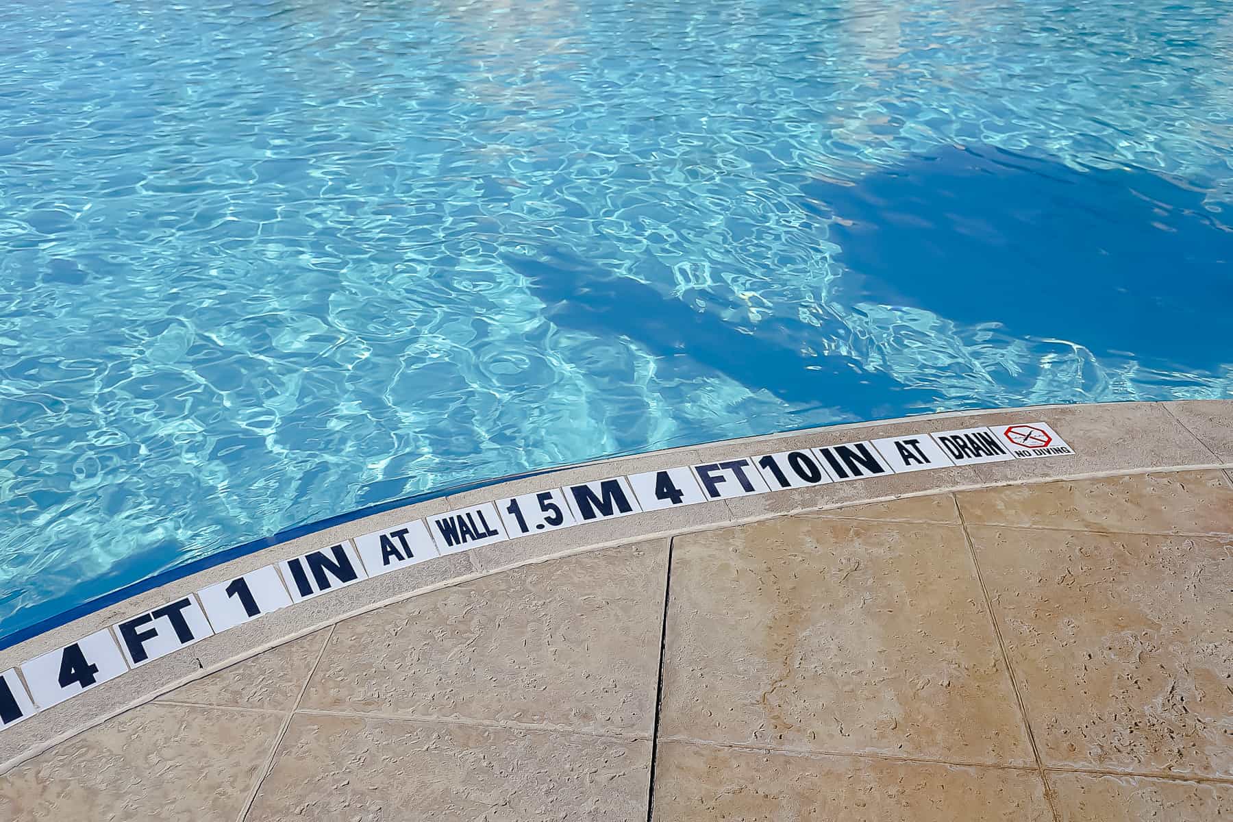 printed concrete shows the pool depth 