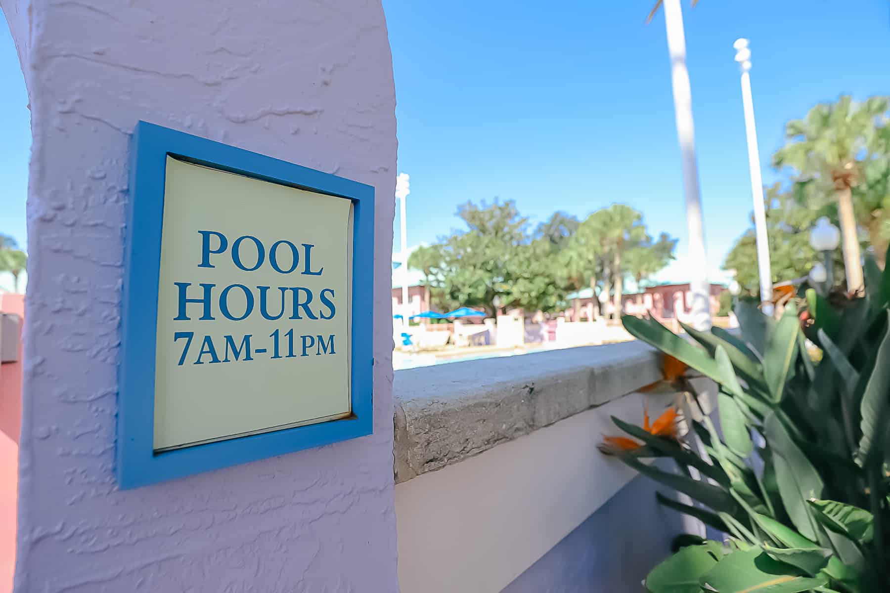 Quiet pool hours sign that says from 7:00 a.m. until 11:00 p.m. 