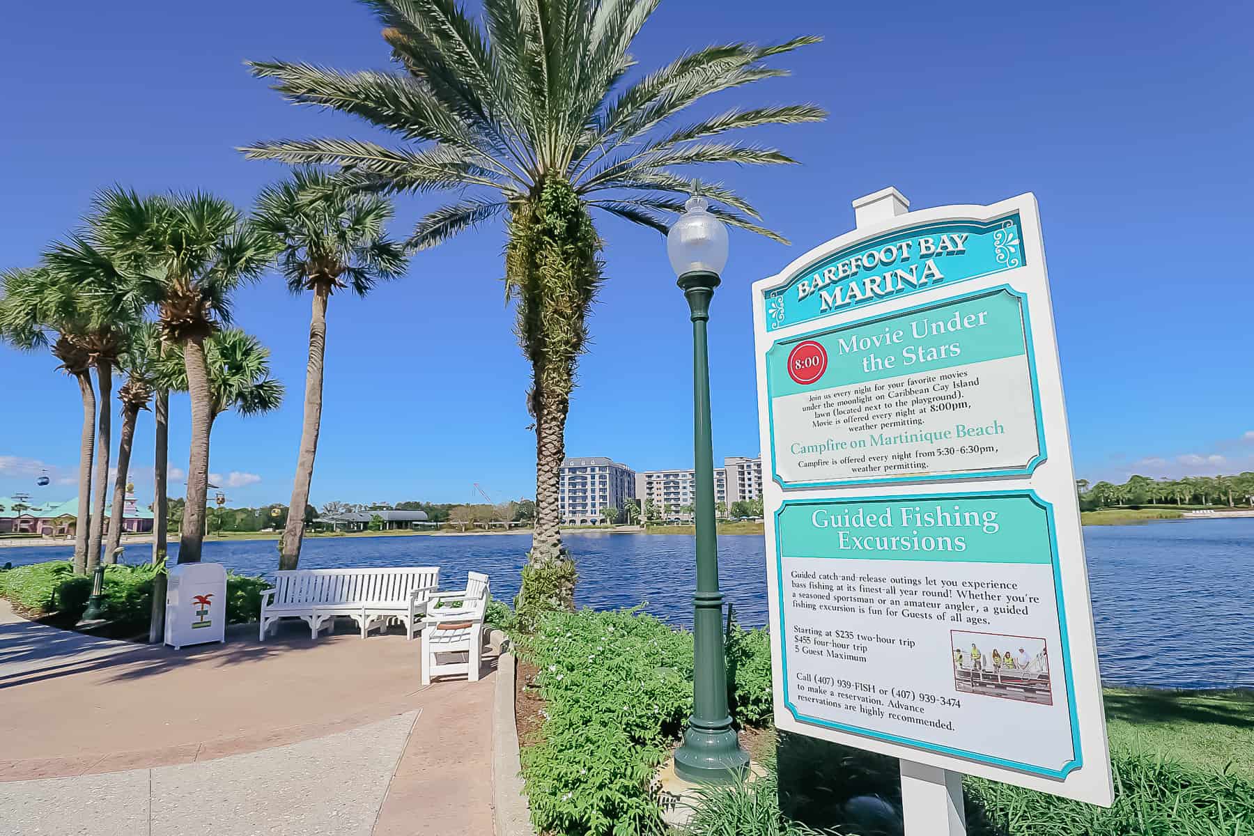 Signs that lists some of the activities at Disney's Caribbean Beach like Movie Under the Stars and Guided Fishing Excursions