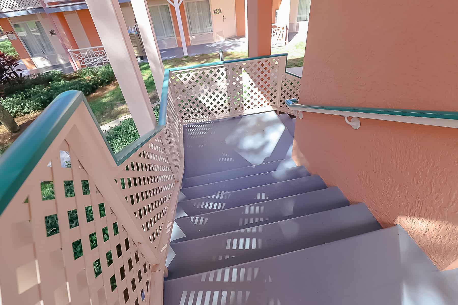 a staircase that leads up to the second floor buildings at Caribbean Beach 