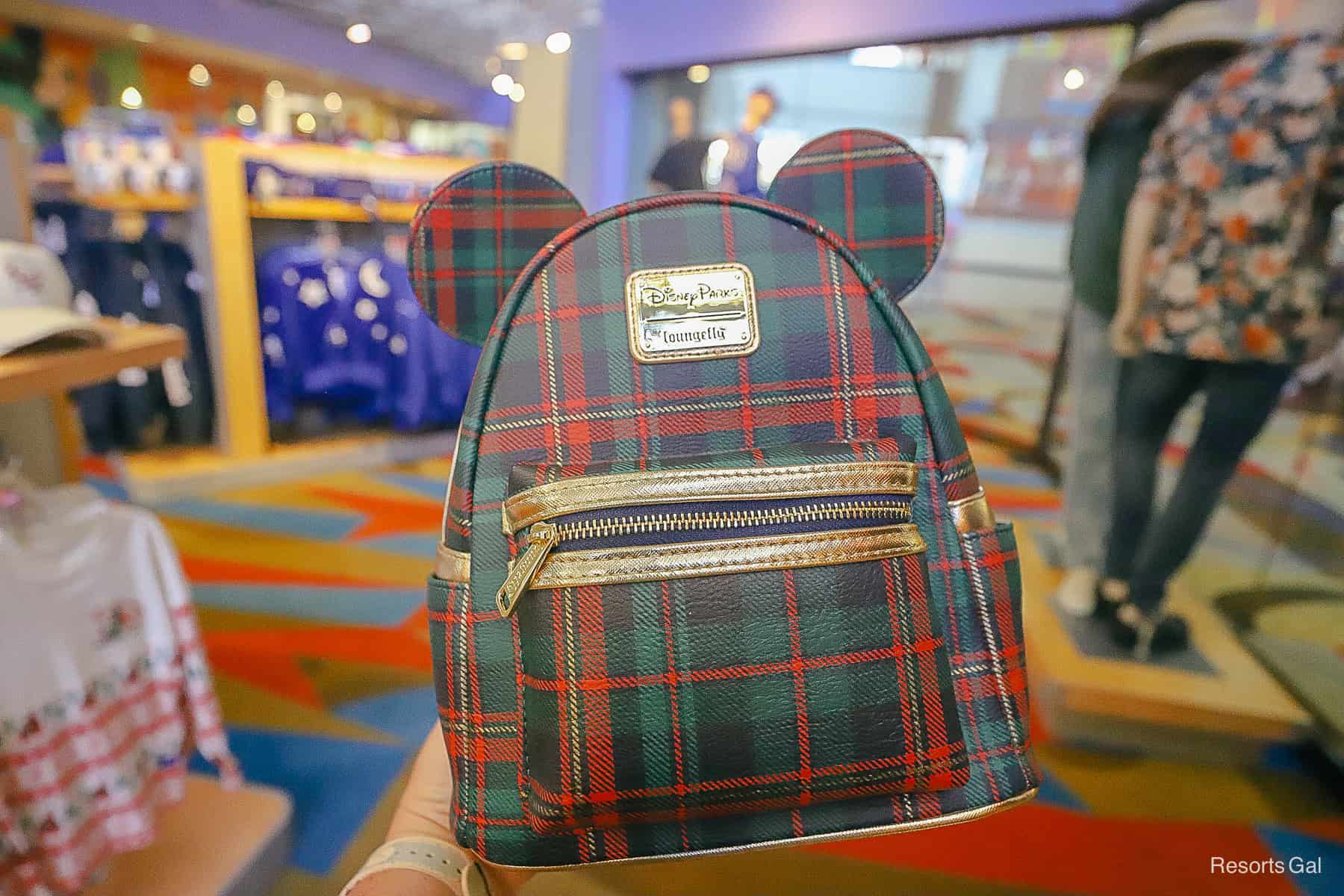 a close up of the plaid Loungefly that shows the Ears 