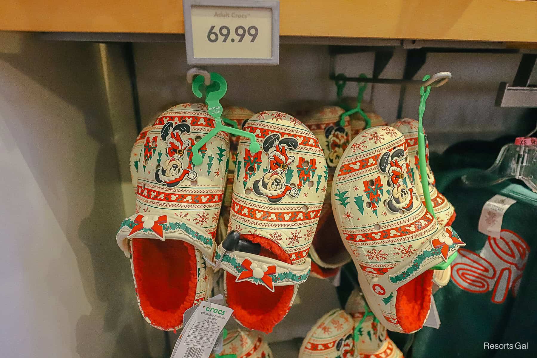 a pair of holiday Mickey Mouse Crocs 