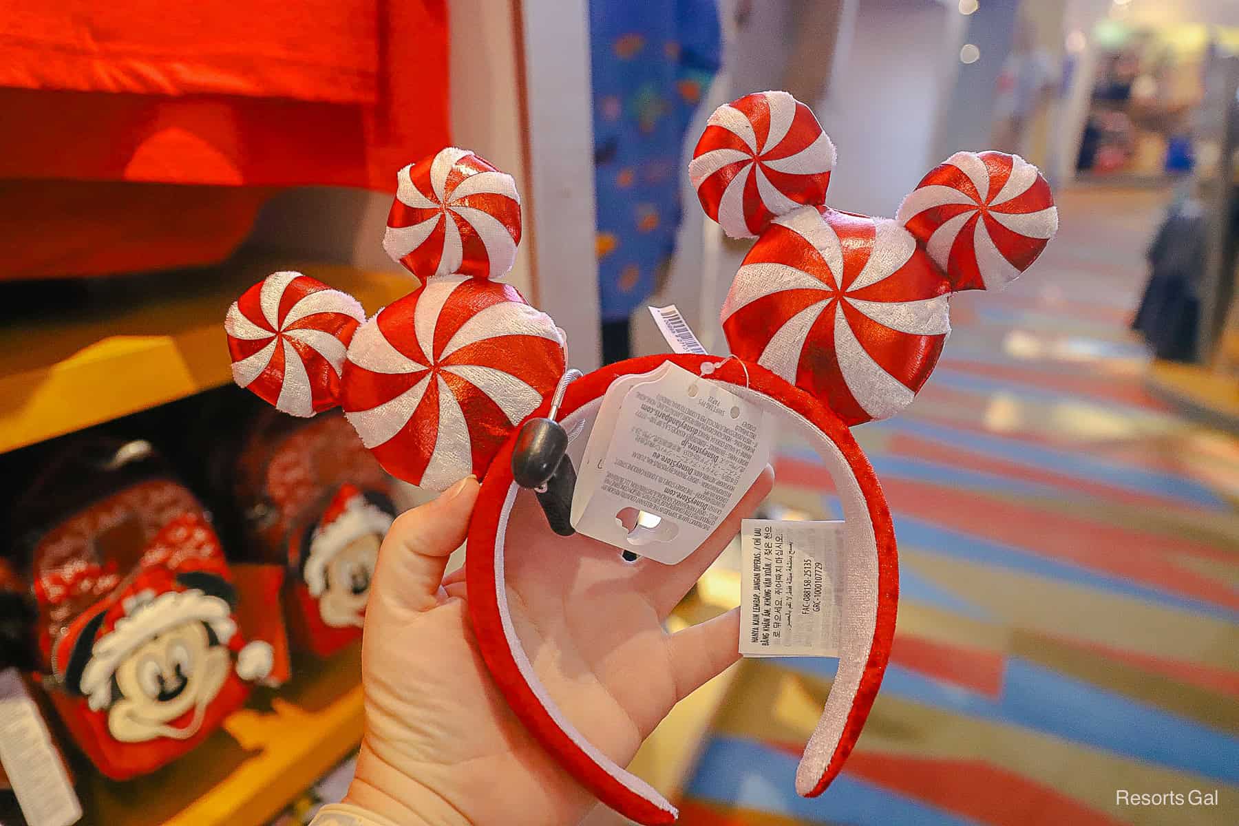 a pair of Minnie ears with peppermint Mickey Mouse as each ear 