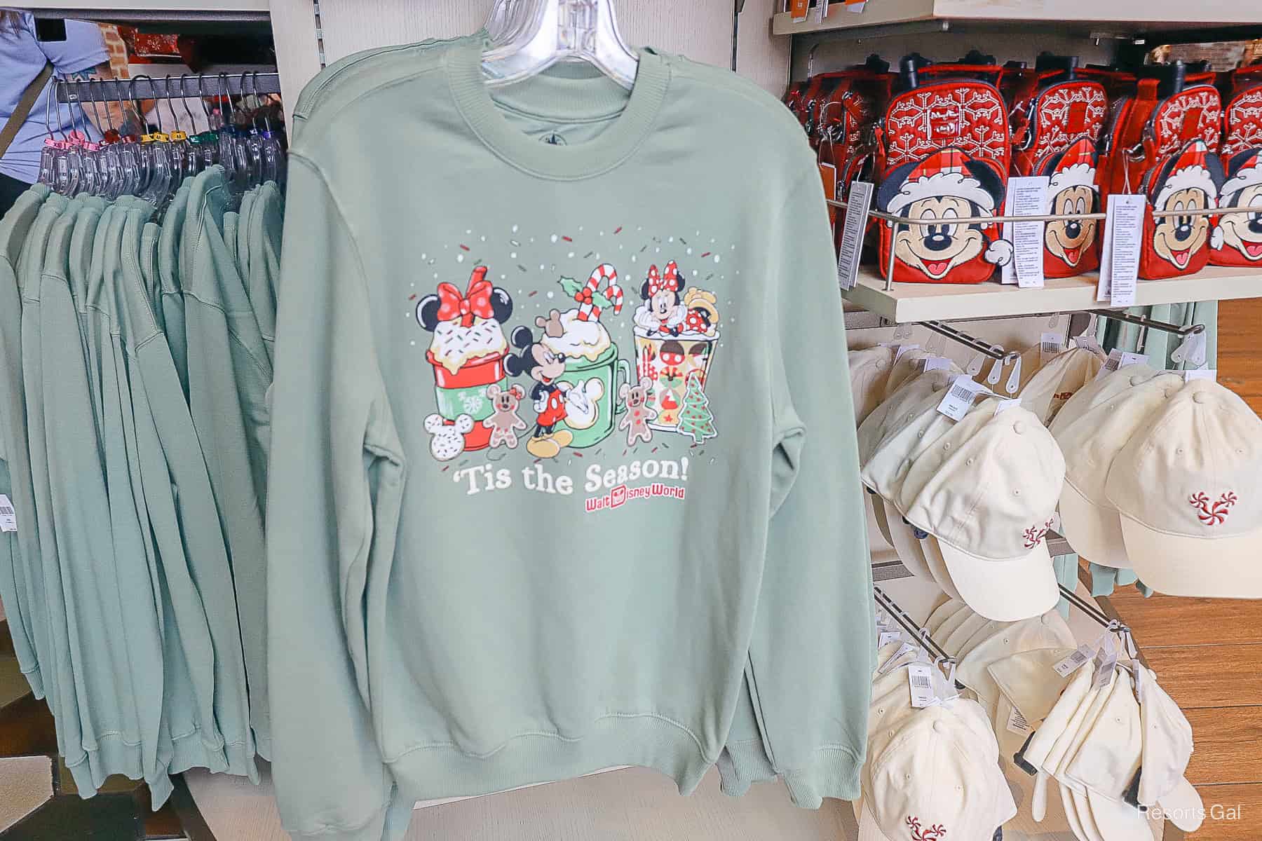 a sweatshirt with Mickey and Minnie Mouse and holiday shakes 