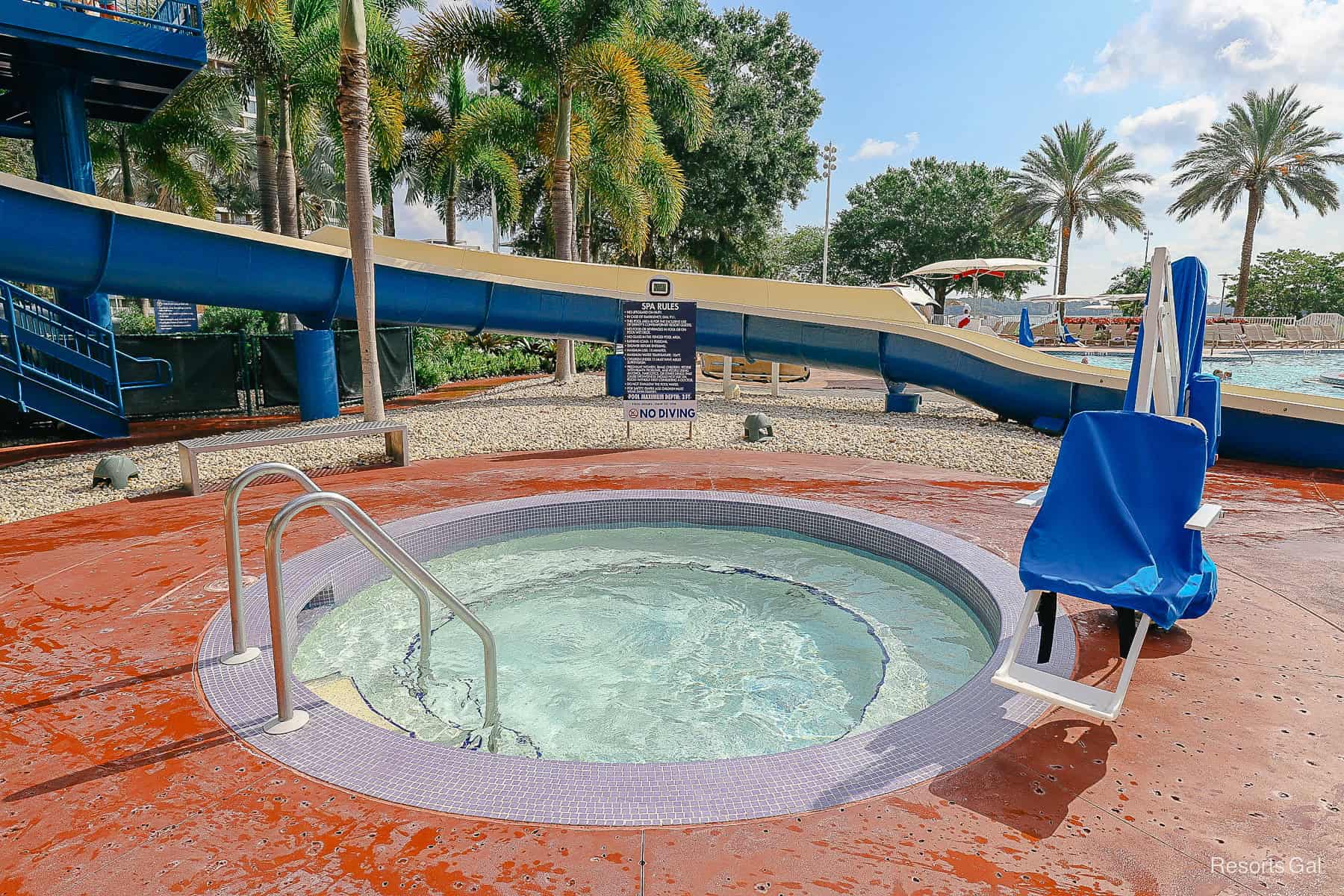 a hot tub with a mobility lift next to it 