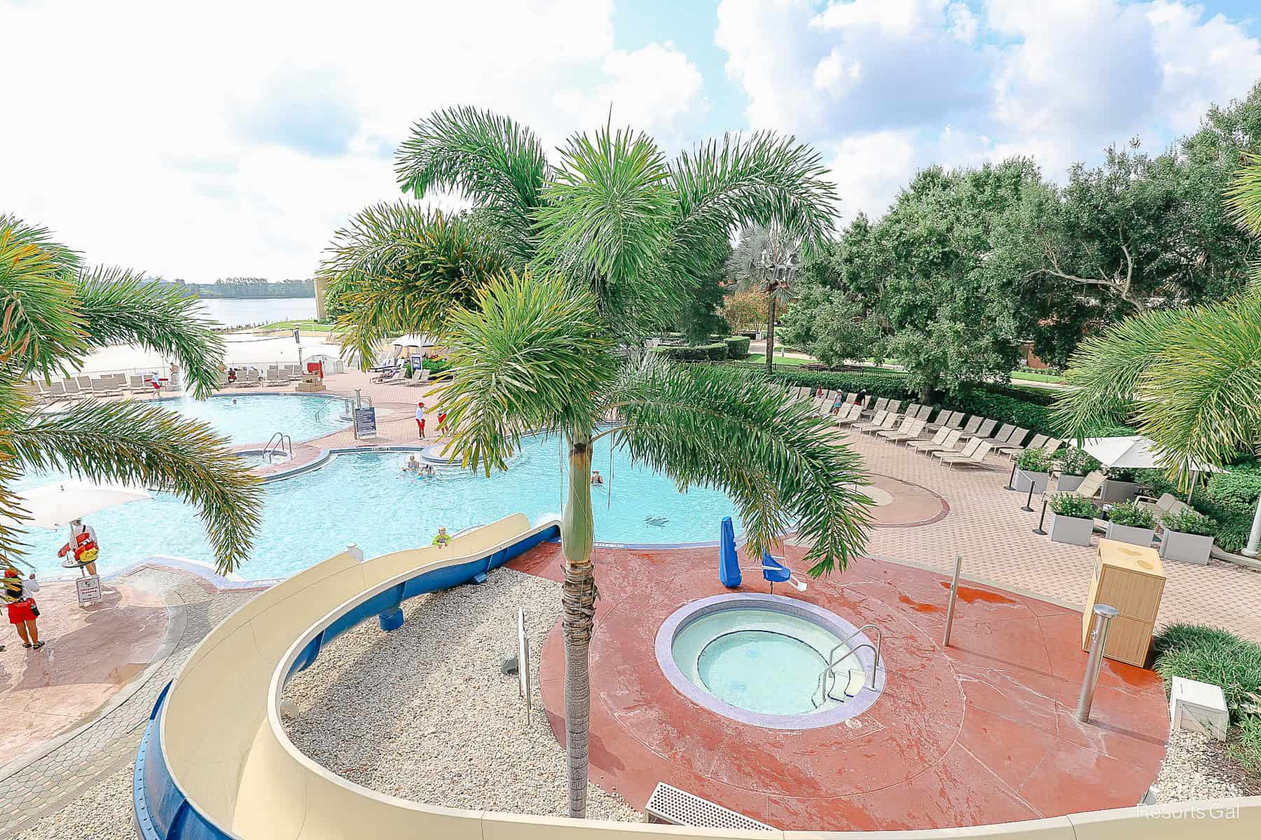 a view of the slide and pool from the top of the slide platform 