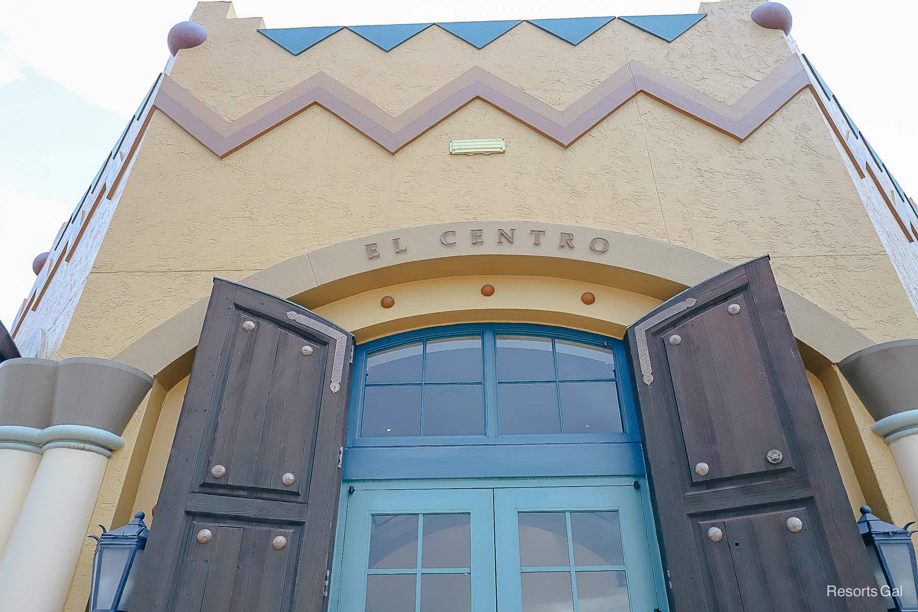 a sign that says El Centro over the resort side entrance of Disney's Coronado Springs