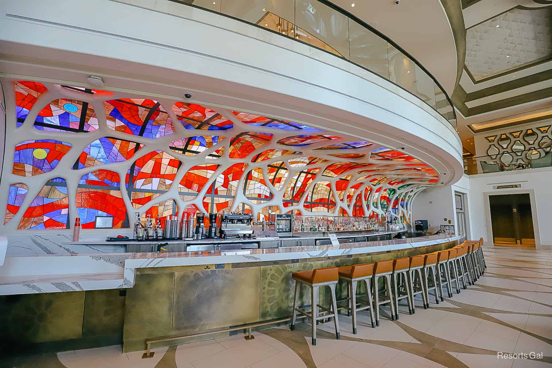 a long row of bar seats at Barcelona Lounge 