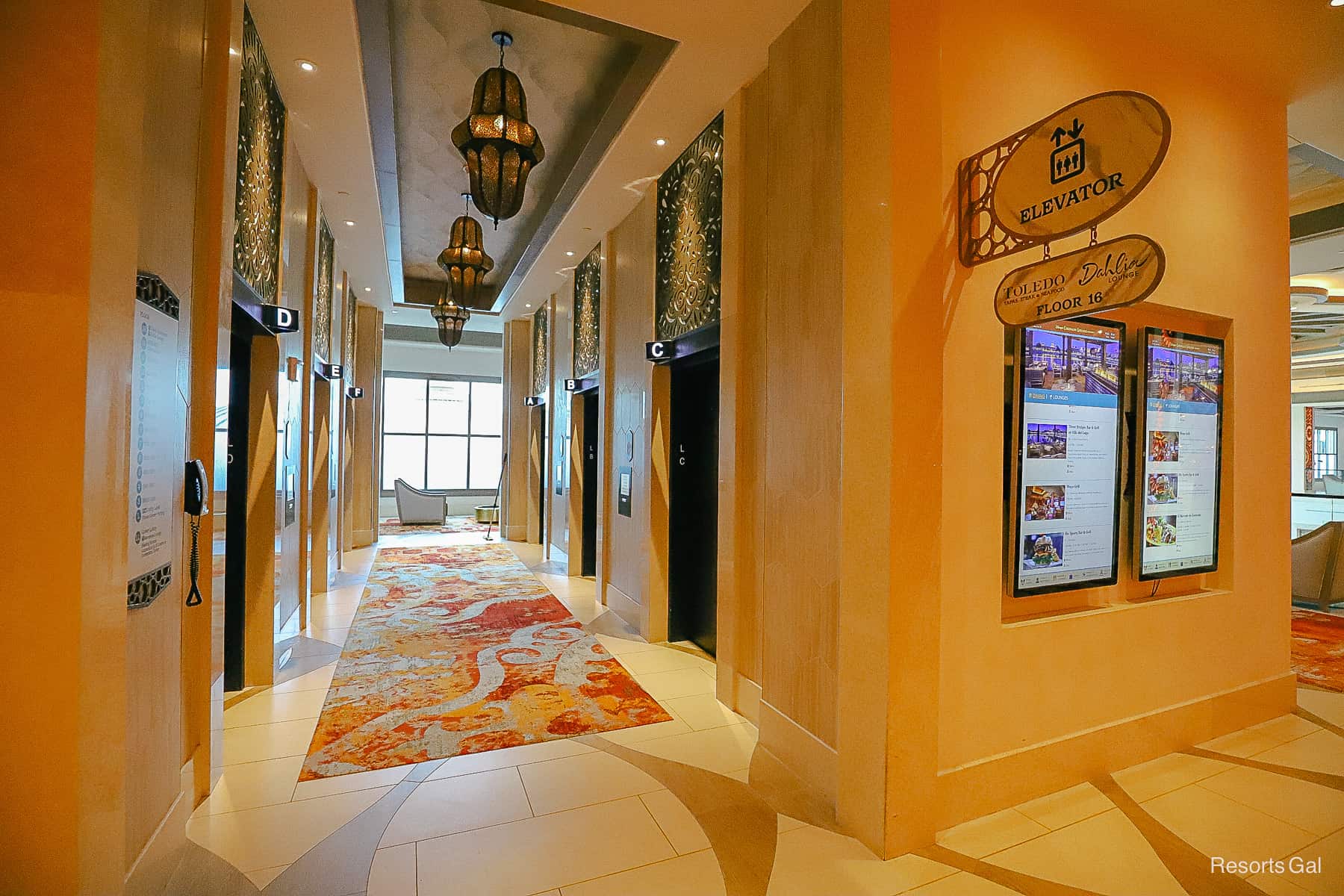 an elevator lobby with six elevators for Gran Destino Tower 