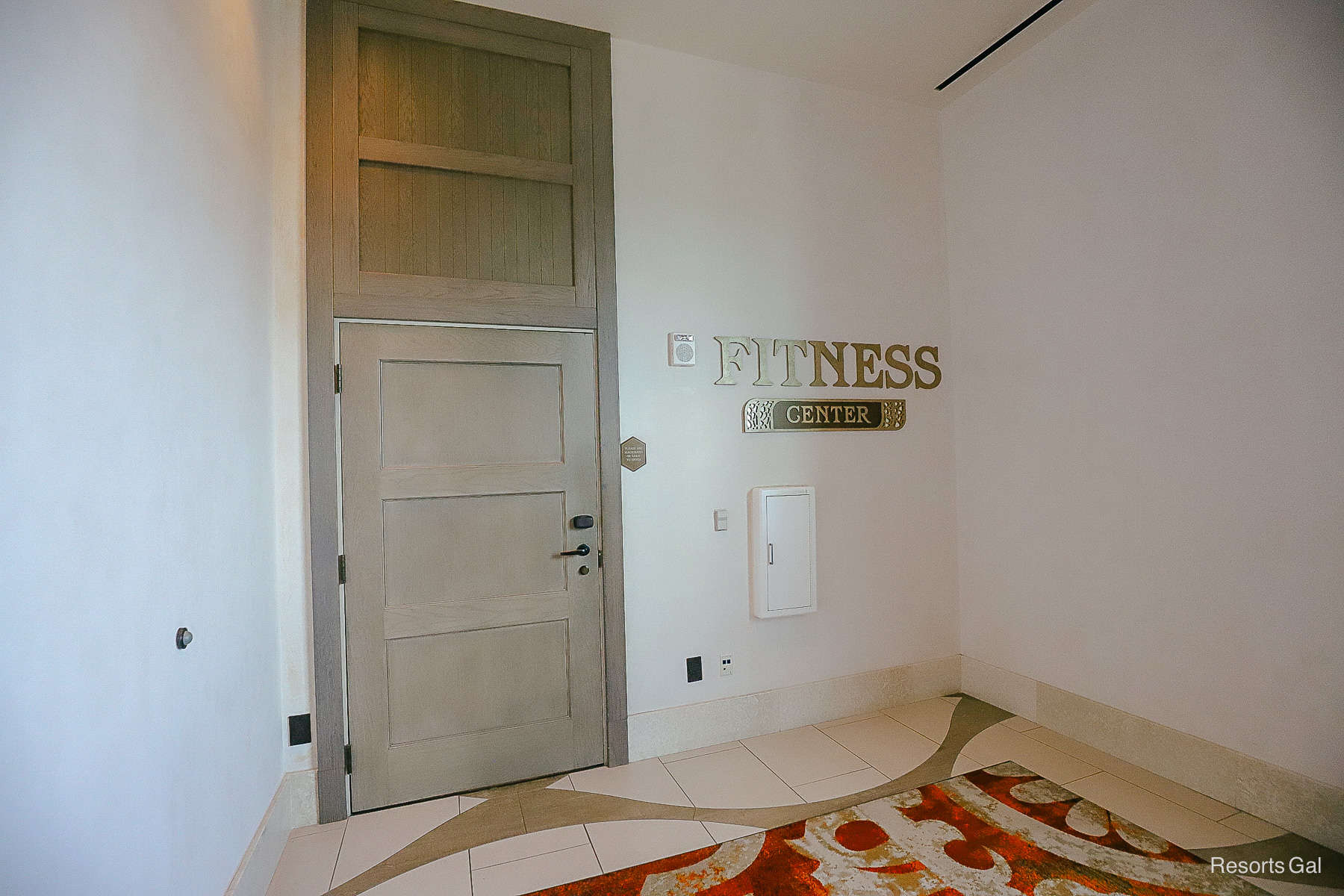 the door to the fitness center at Gran Destino Tower 