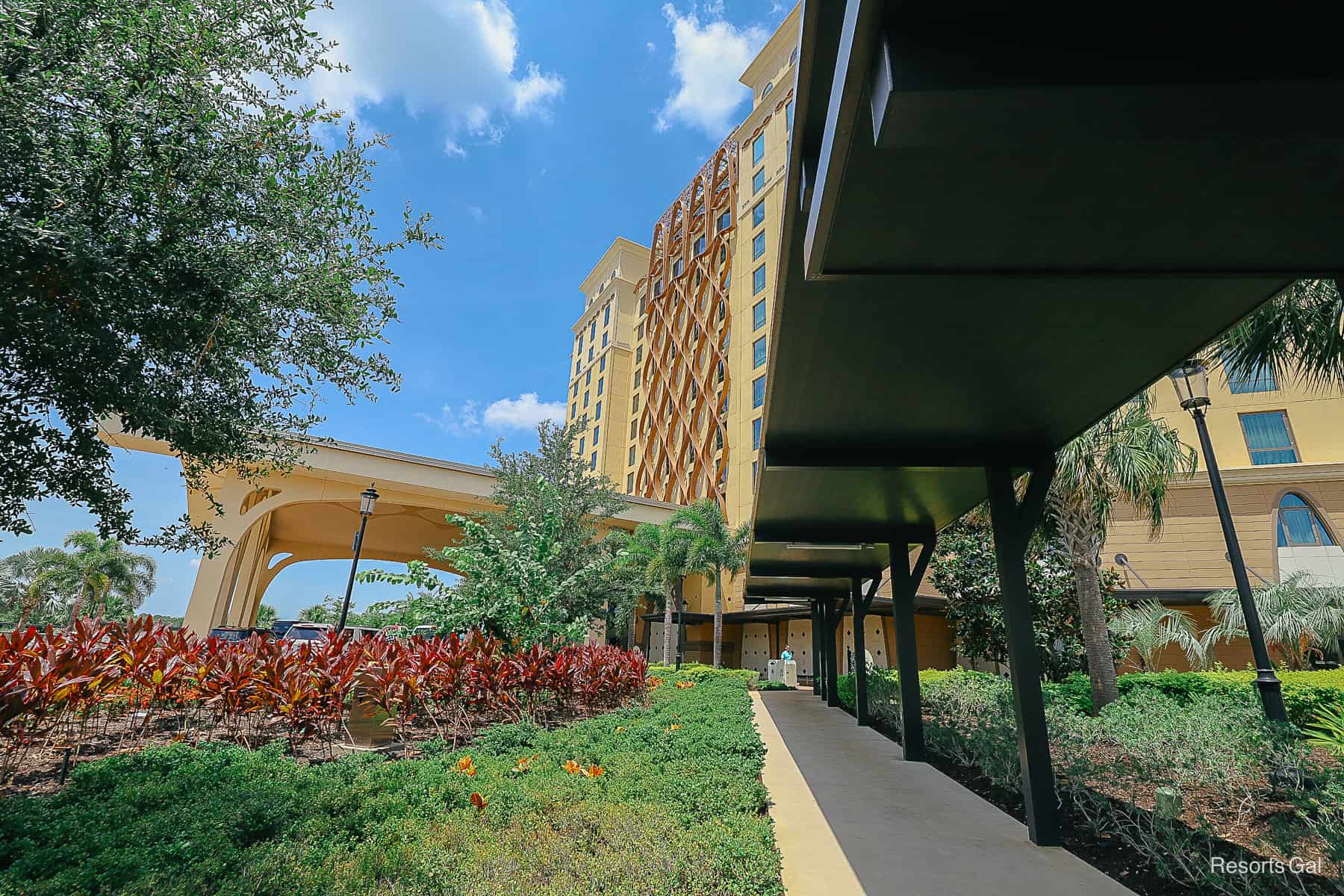 the covered walkway from the parking lot to the entrance of Gran Destino Tower 