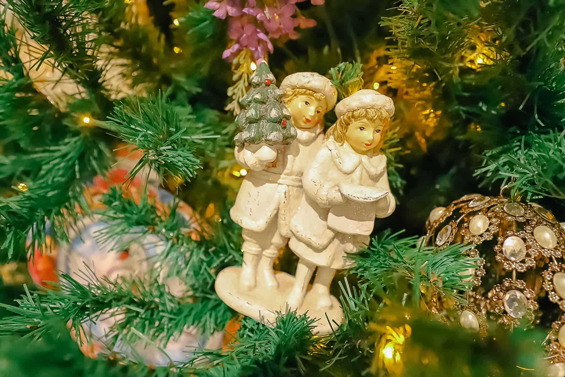 a Victorian boy and girl ornament 