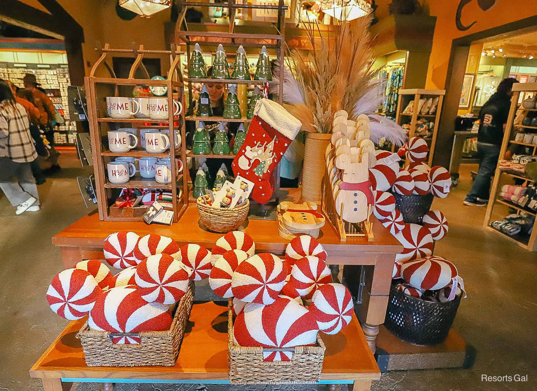 a display filled with "home" branded Disney Christmas merchandise