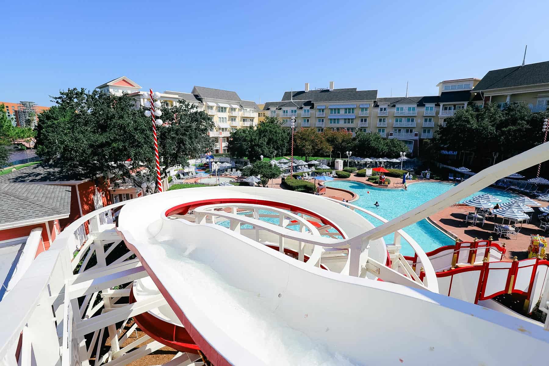 a view from the top of the water slide looking toward the pool