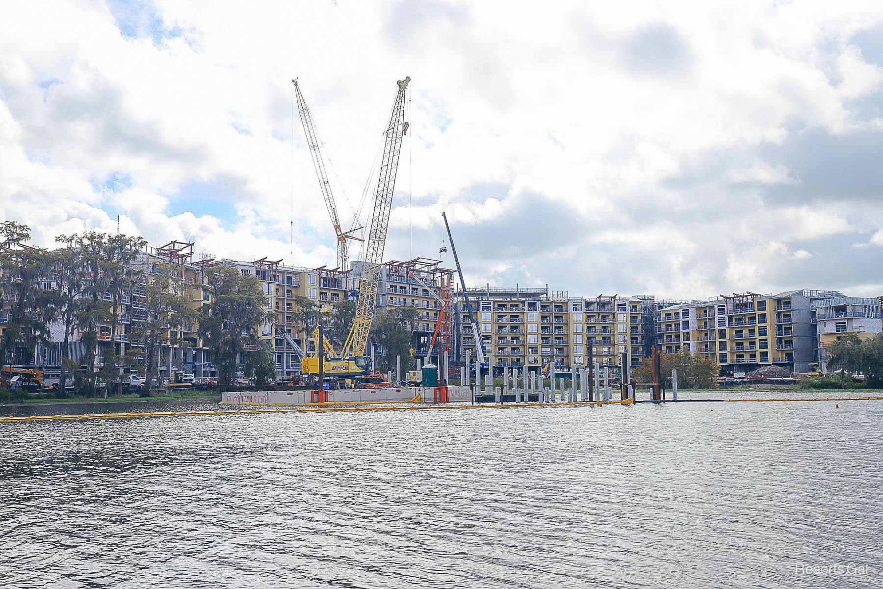construction taking place with cranes at Lakeshore Lodge