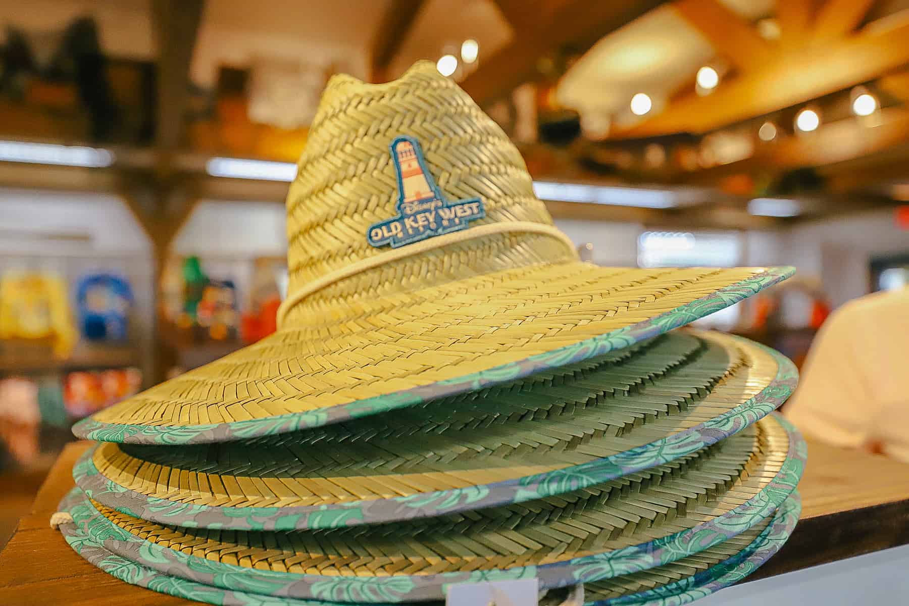 a straw hat with the Old Key West logo 