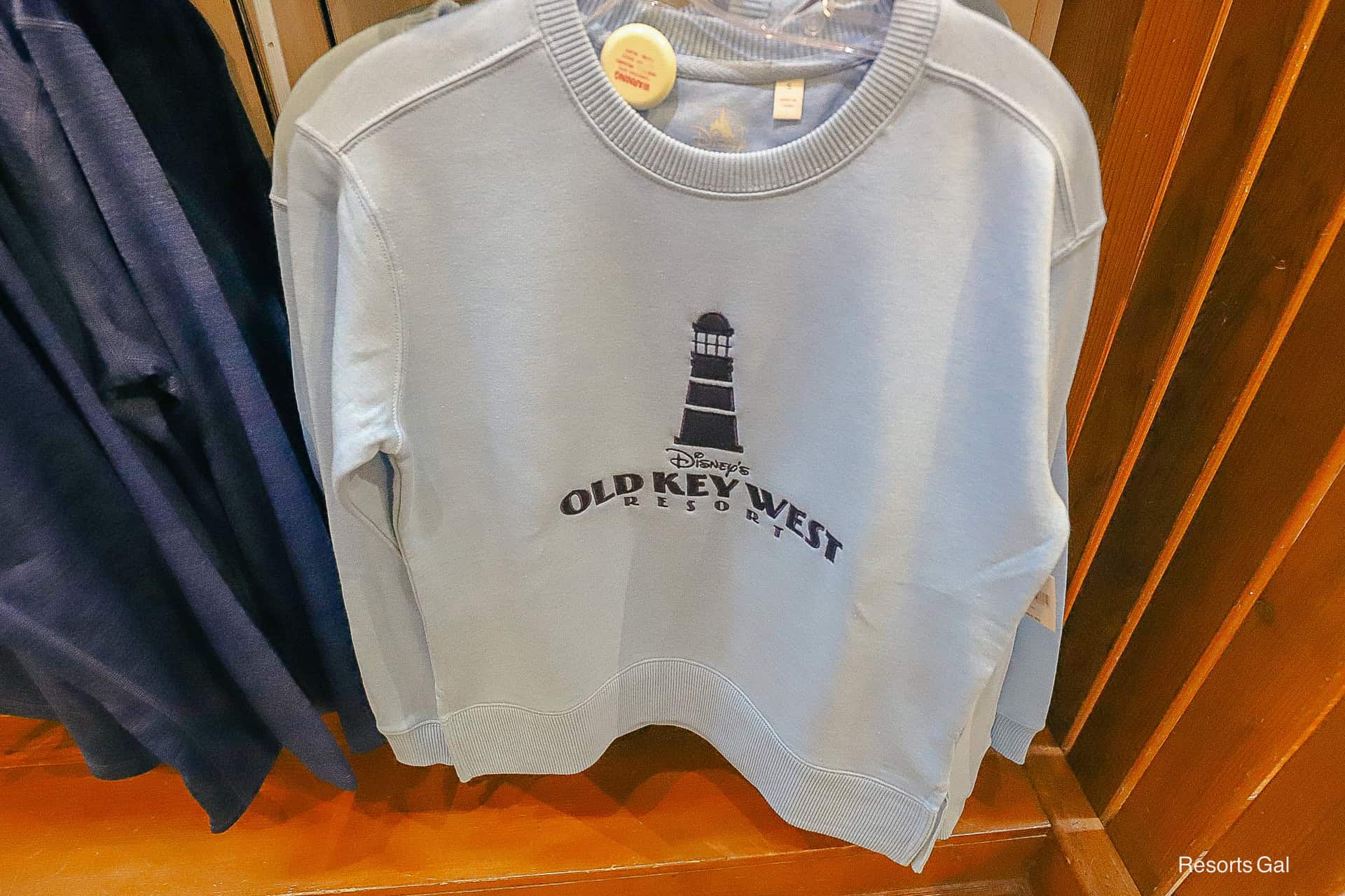 Light blue sweater with Old key West logo