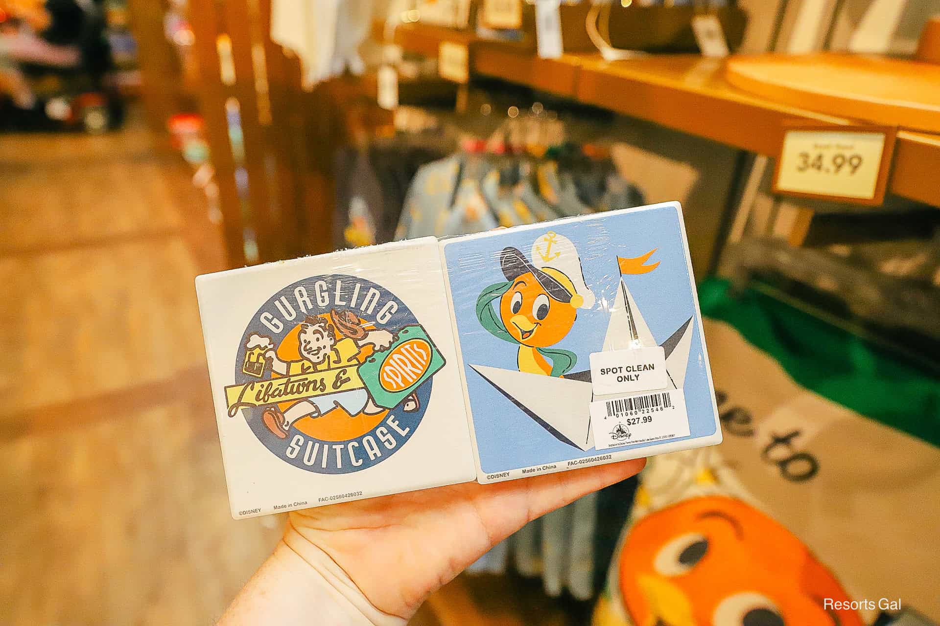 back side of the four coaster set with Orange bird and Gurgling suitcase logo