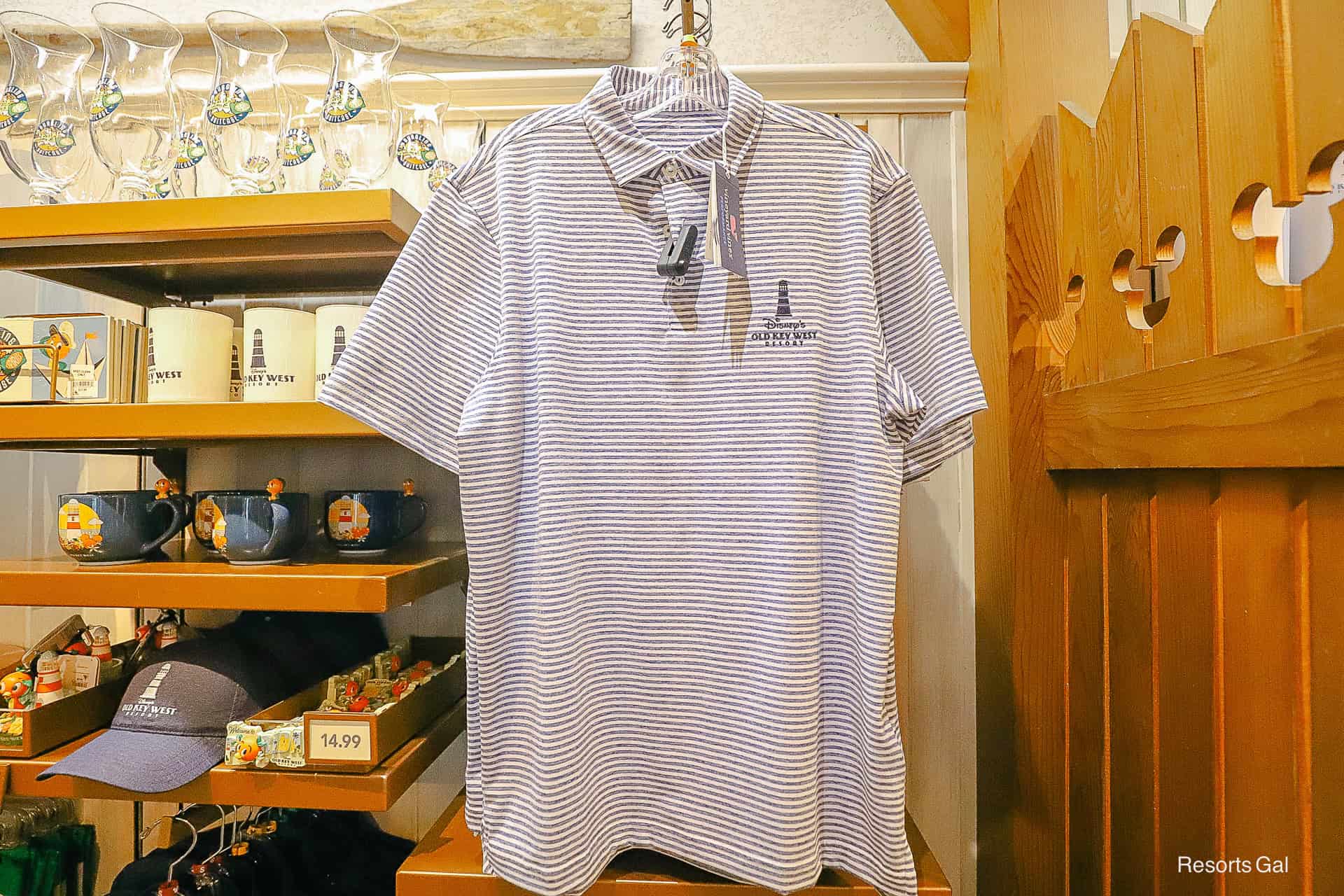 polo style shirt by Vineyard Vines with blue stripe and Old Key West Logo
