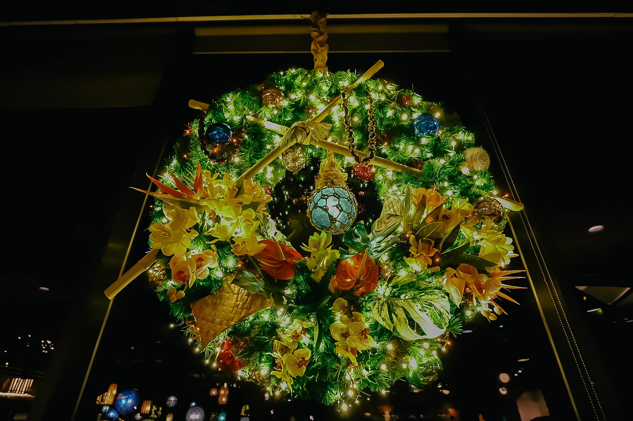 A wreath hanging in the lobby of the Polynesian at Christmas.