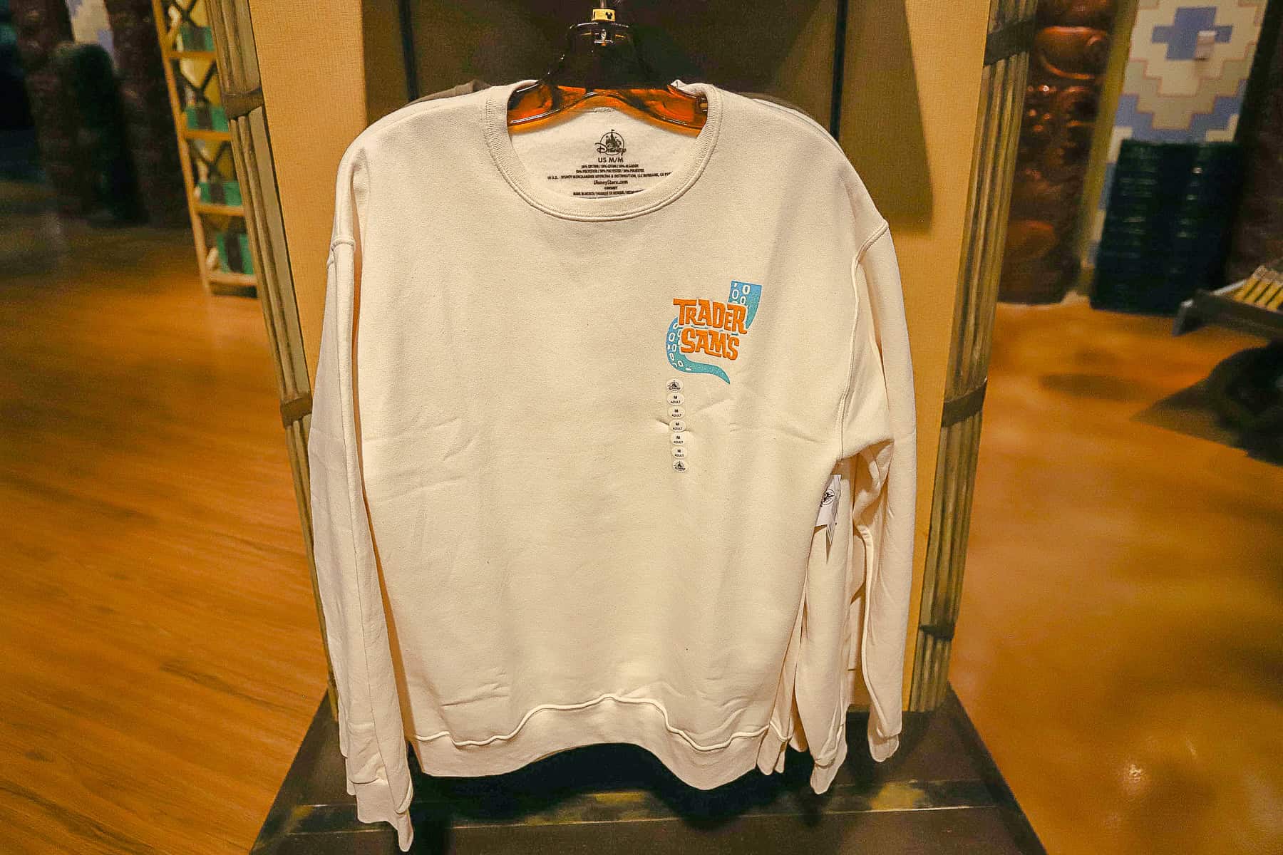 a sweatshirt with the Trader Sam's logo