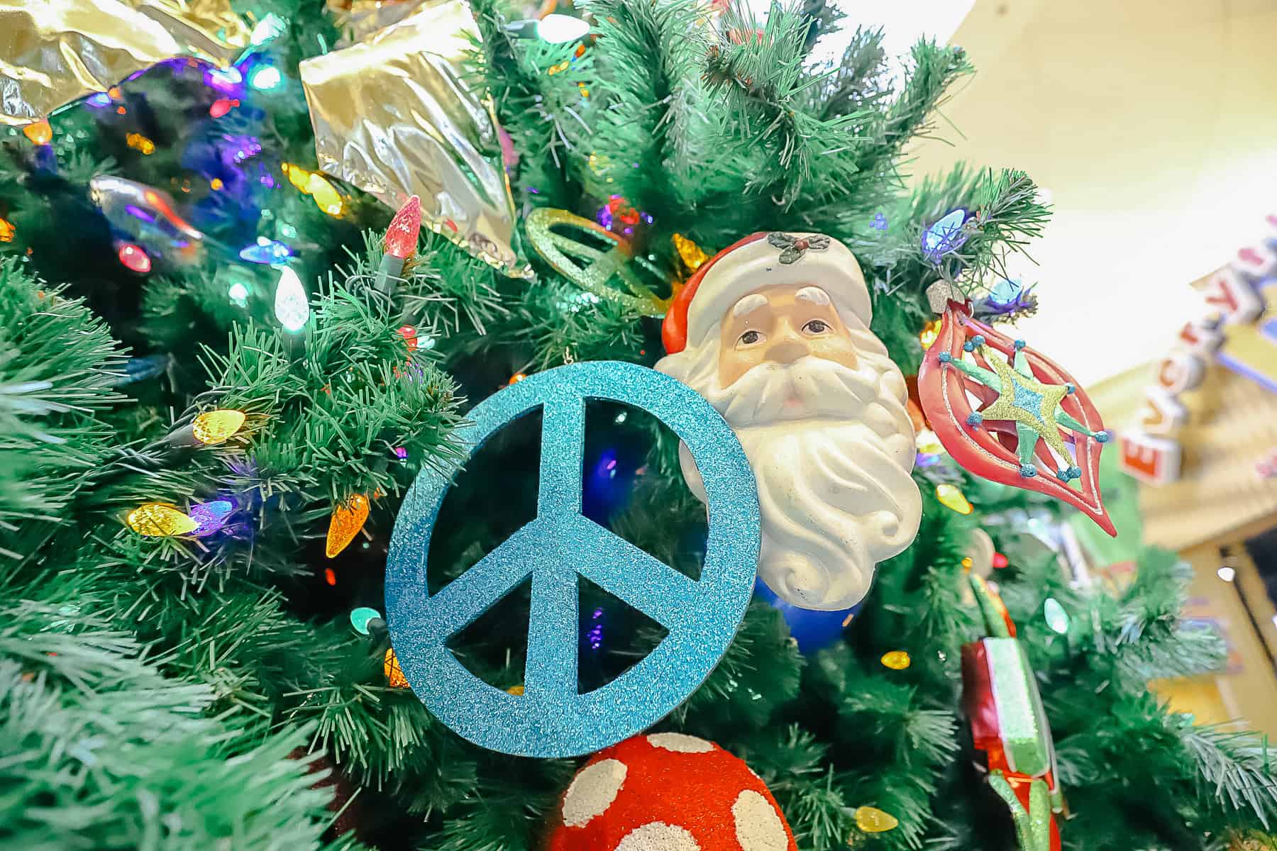 a peace sign ornament and a Santa Claus 