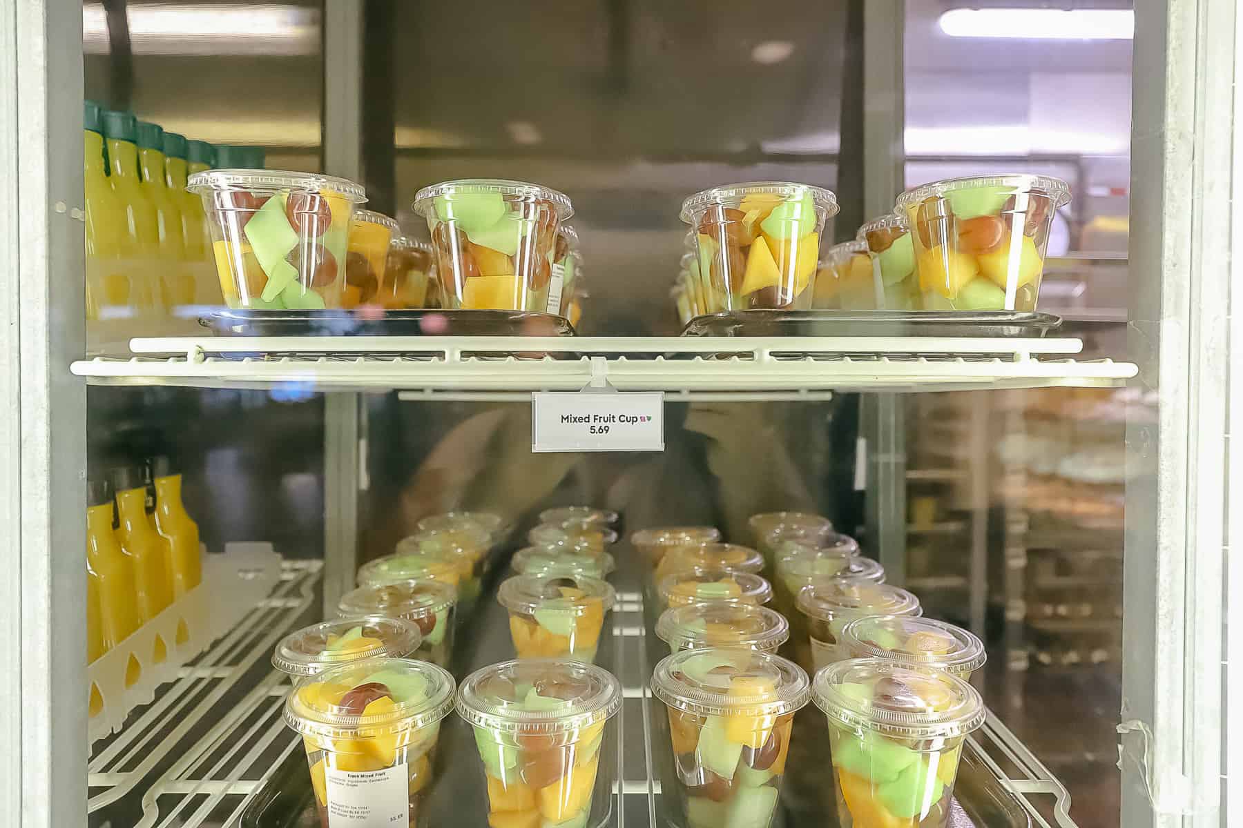 mixed fruit cups in the refrigerated case at the food court 