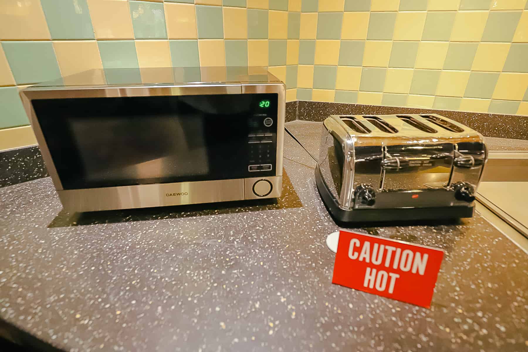 a microwave and a toaster on the counter of the Everything Pop food court 
