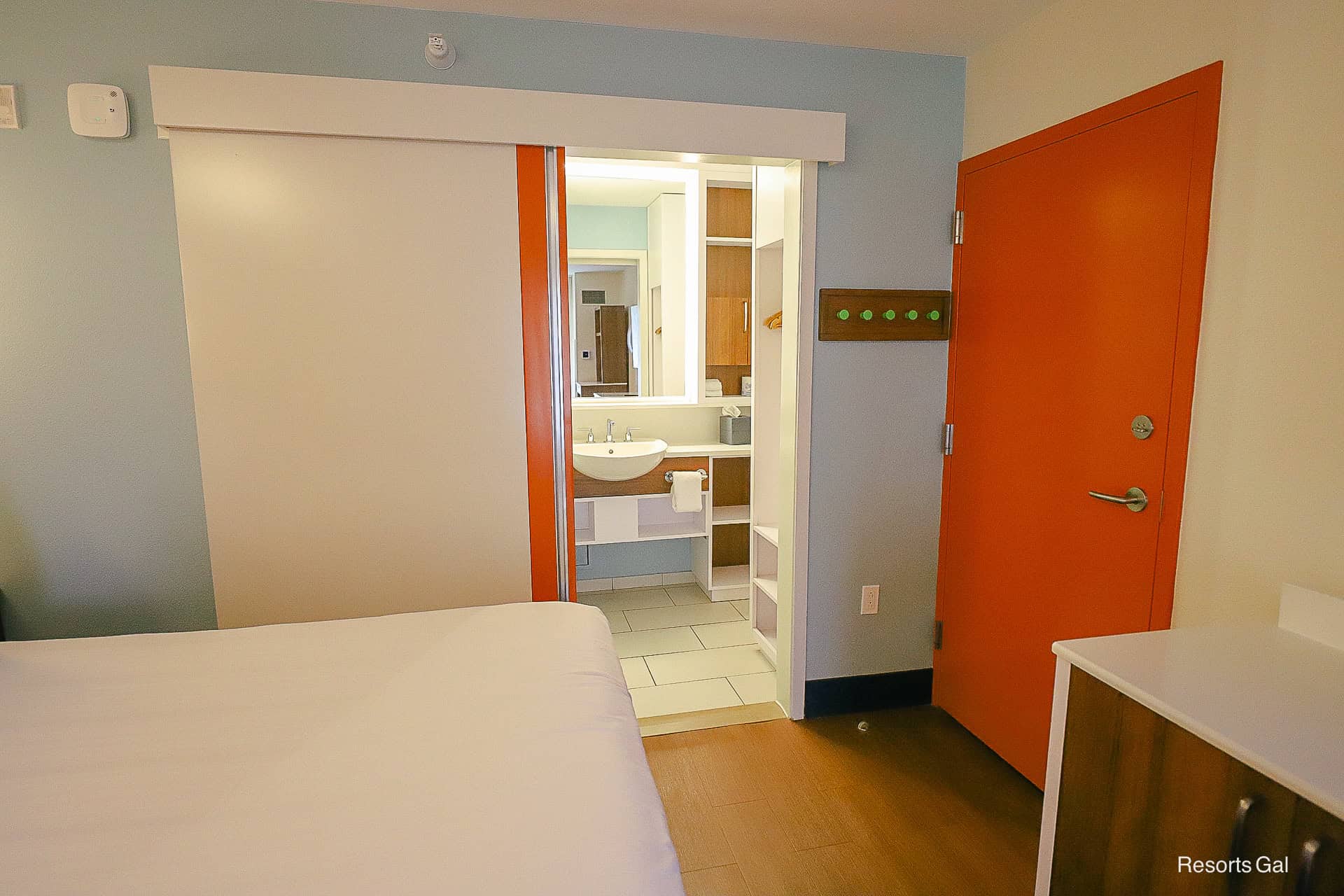 the adjoining door is an option if you book connecting rooms at Disney's Pop Century 