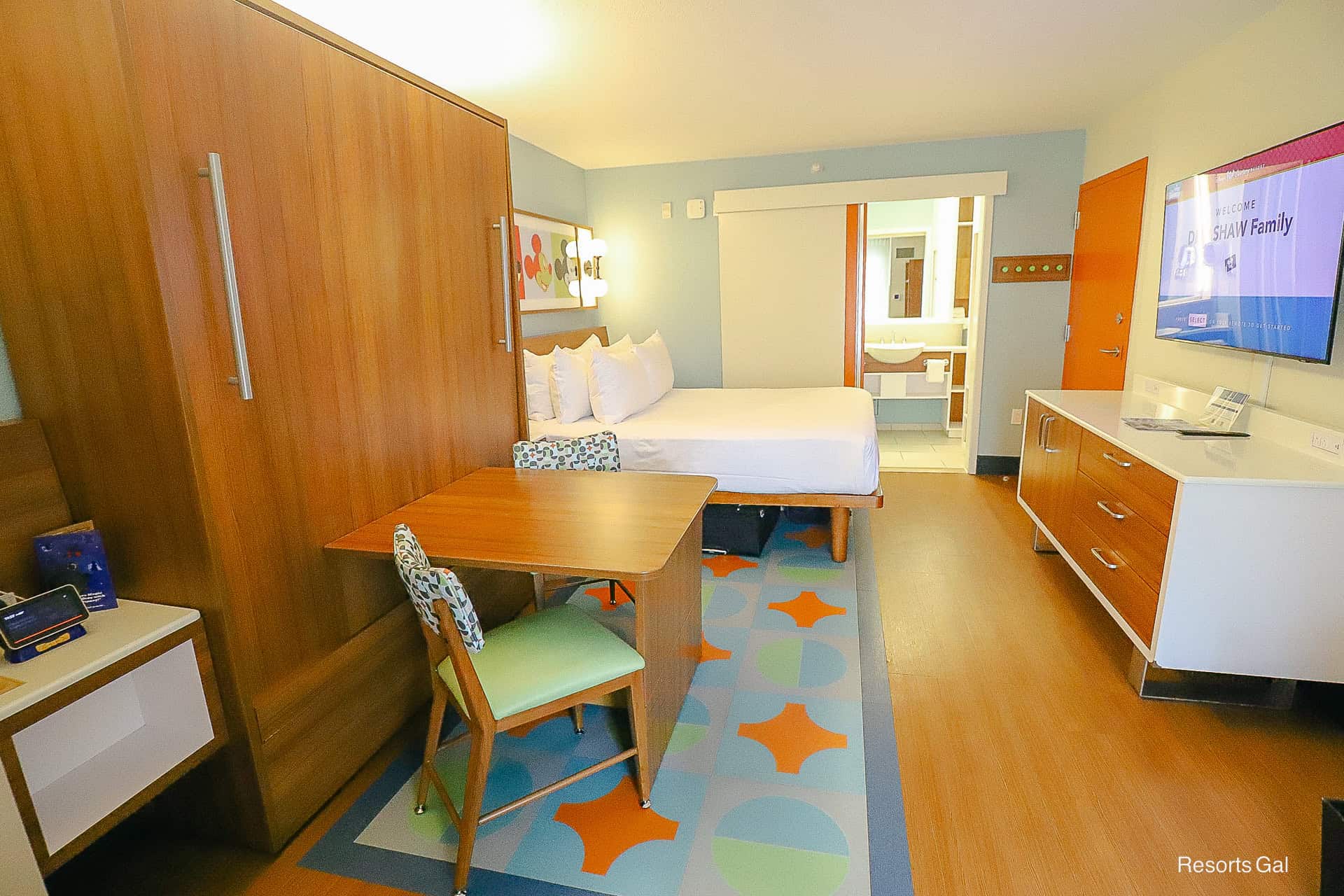 Pop Century Room with table bed in storage position 