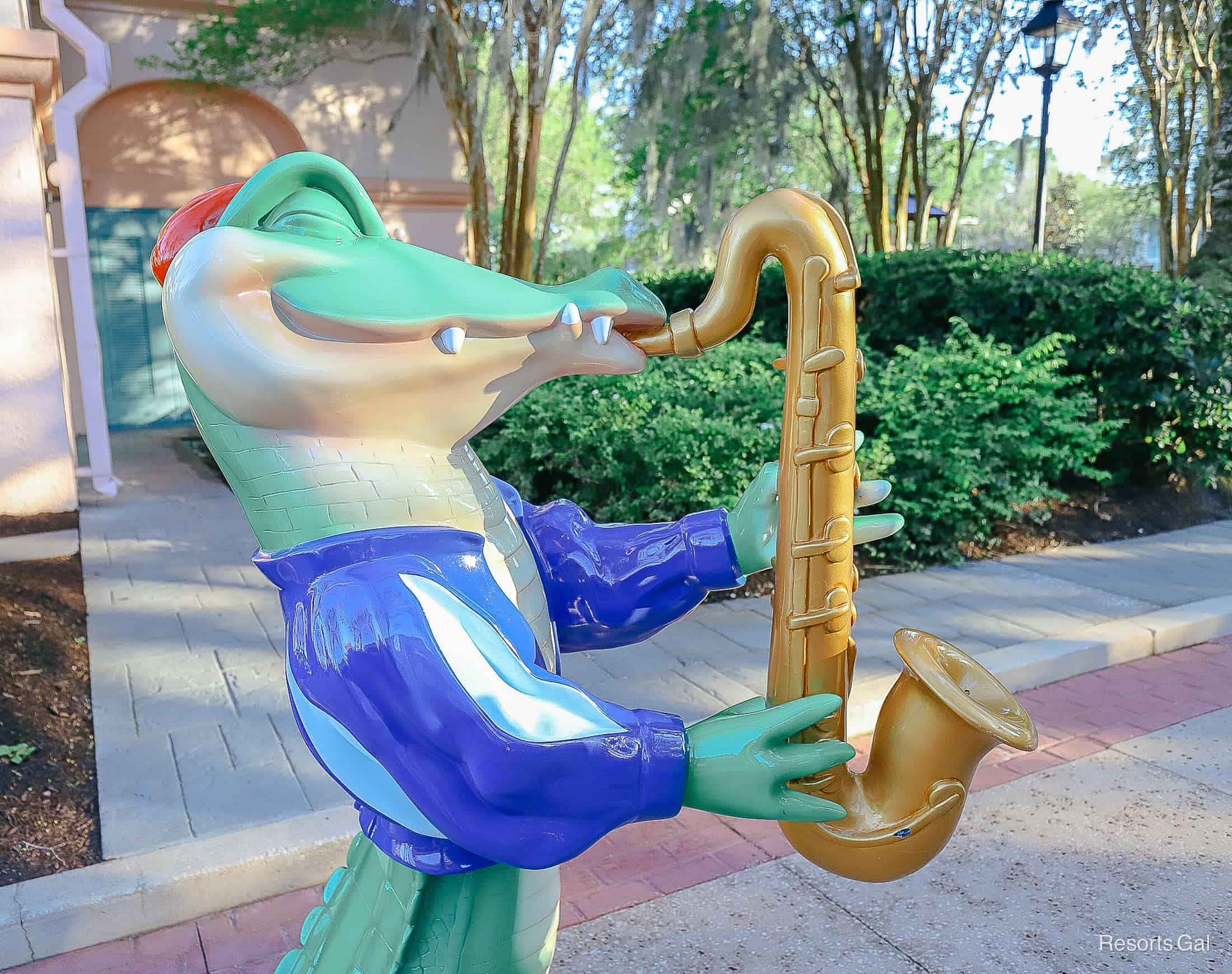 a jazz playing alligator at Port Orleans French Quarter Disney World 