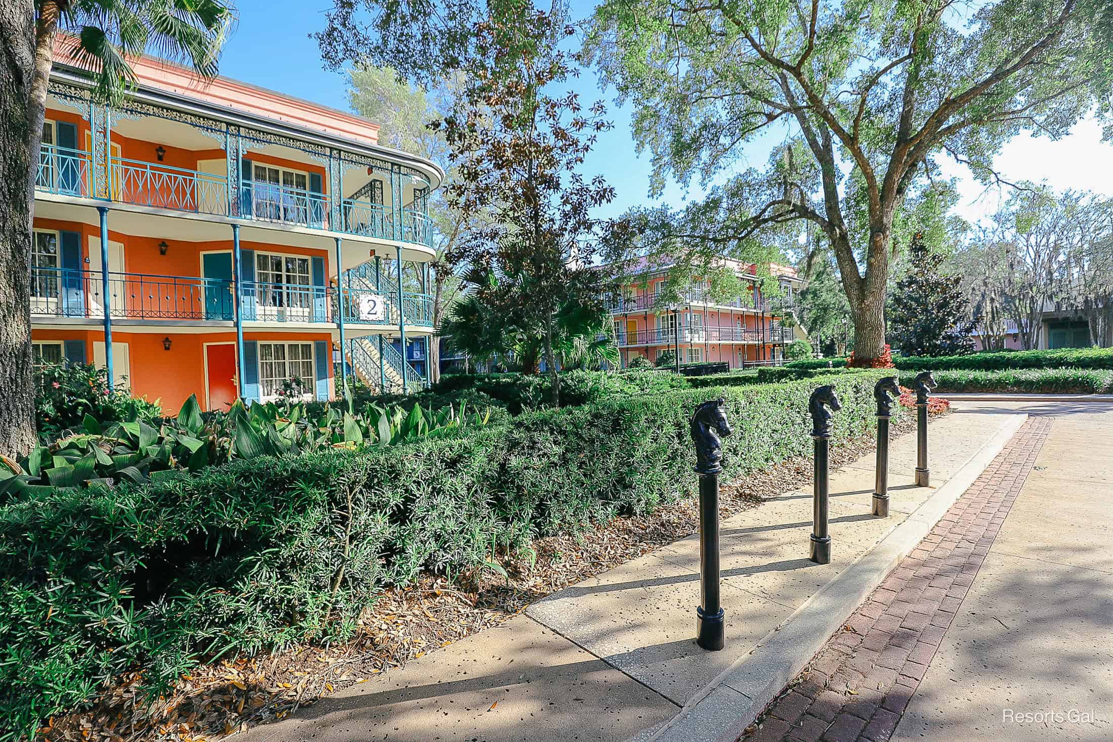 a row of iron horses in front of building two at Port Orleans French Quarter 