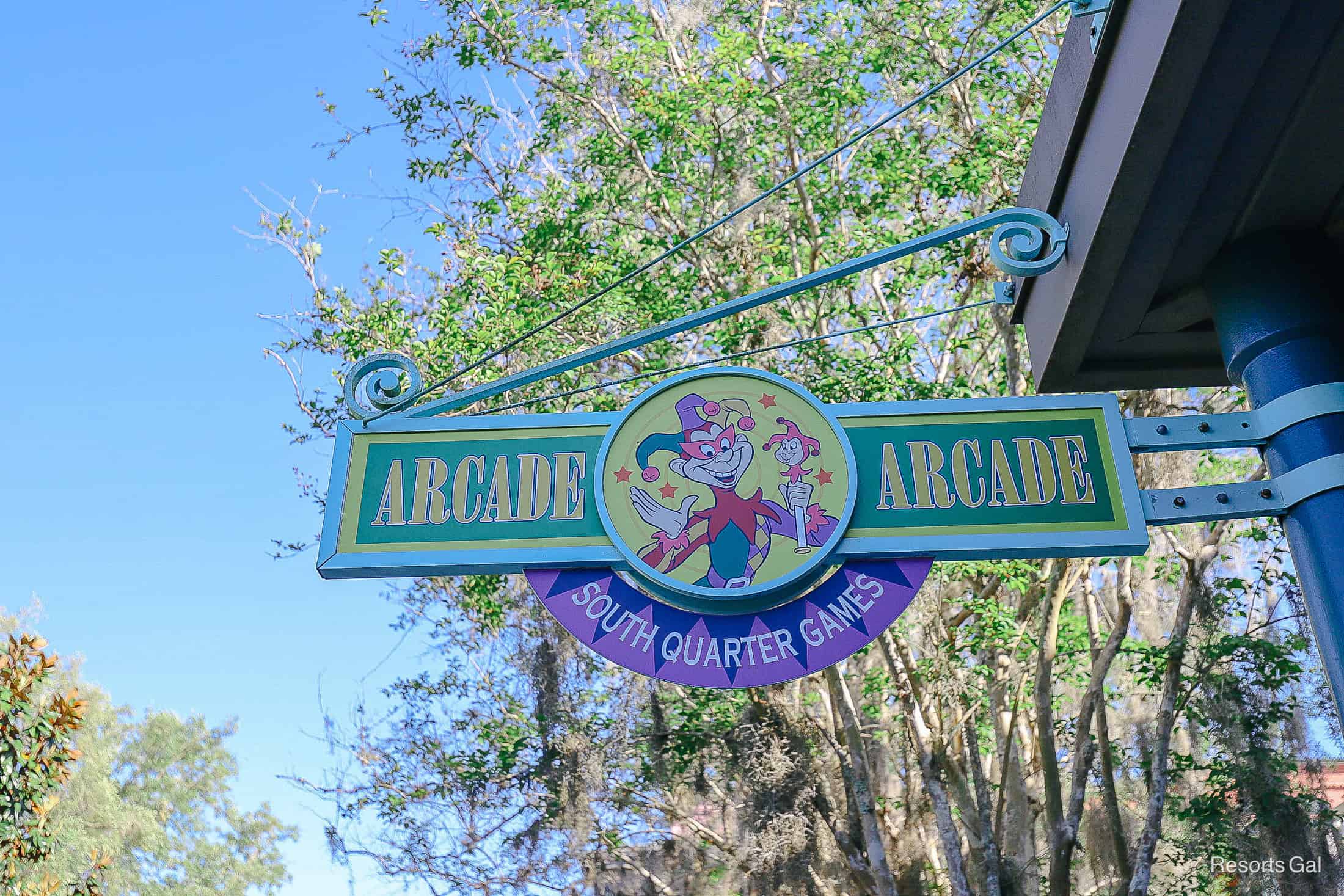 a sign that says "Arcade, Arcade South Quarter Games" 