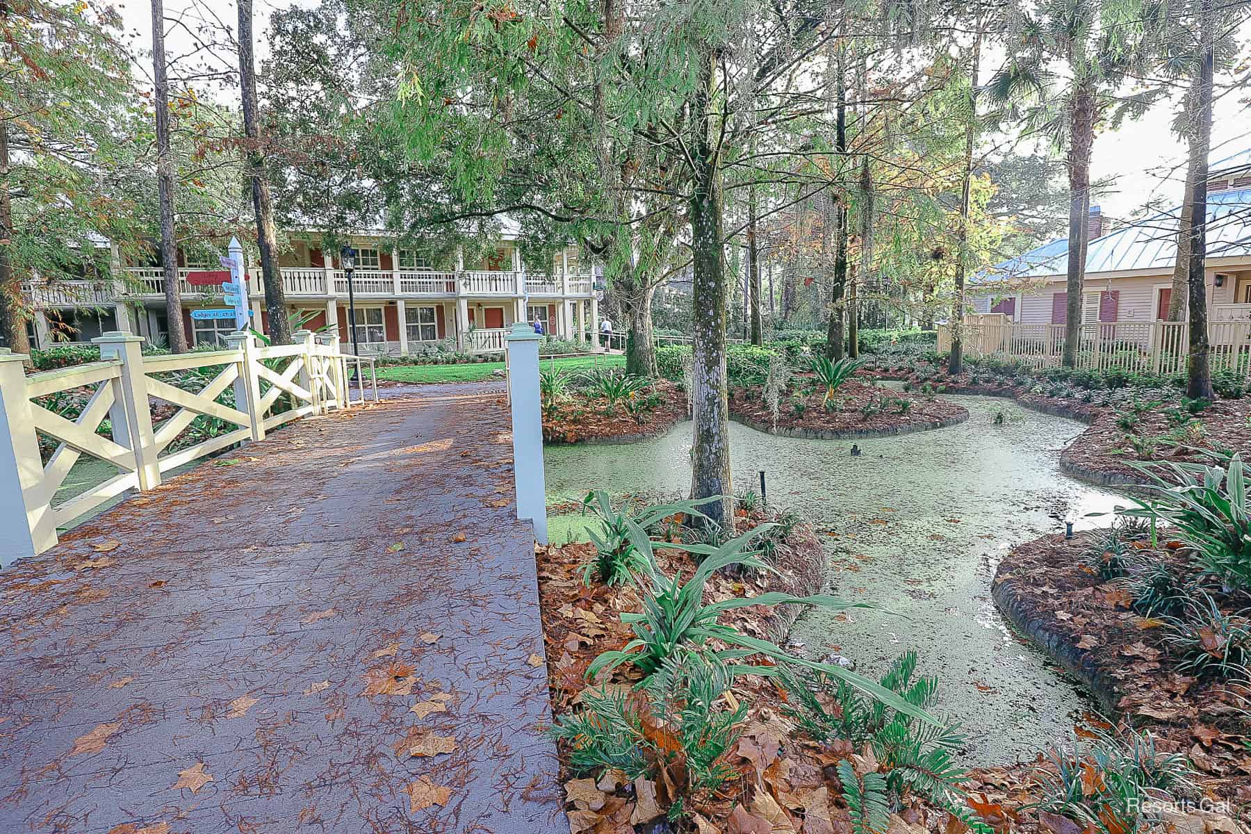 a small bridge crossing to a section of buildings 