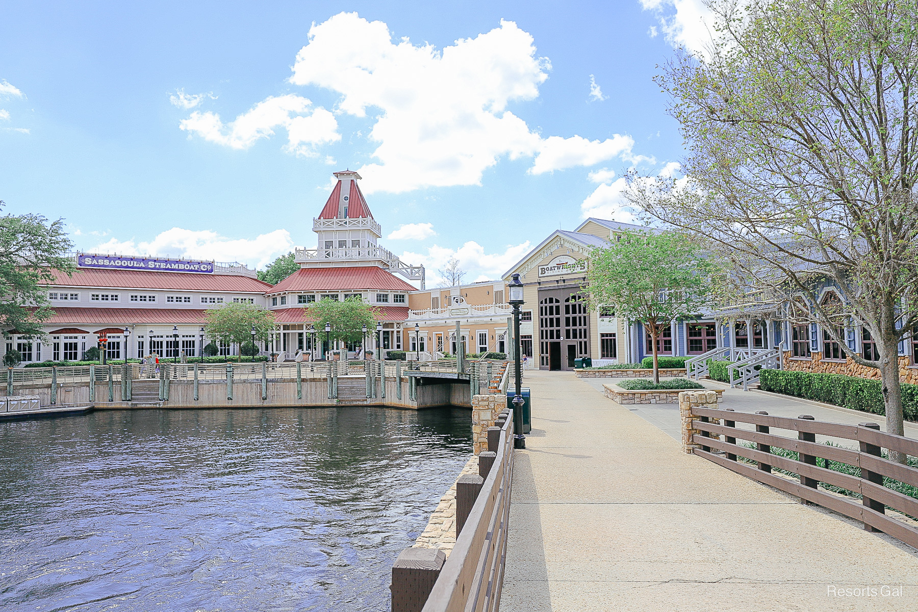 a view of the hub or Port Orleans Riverside standing from a nearby bridge 