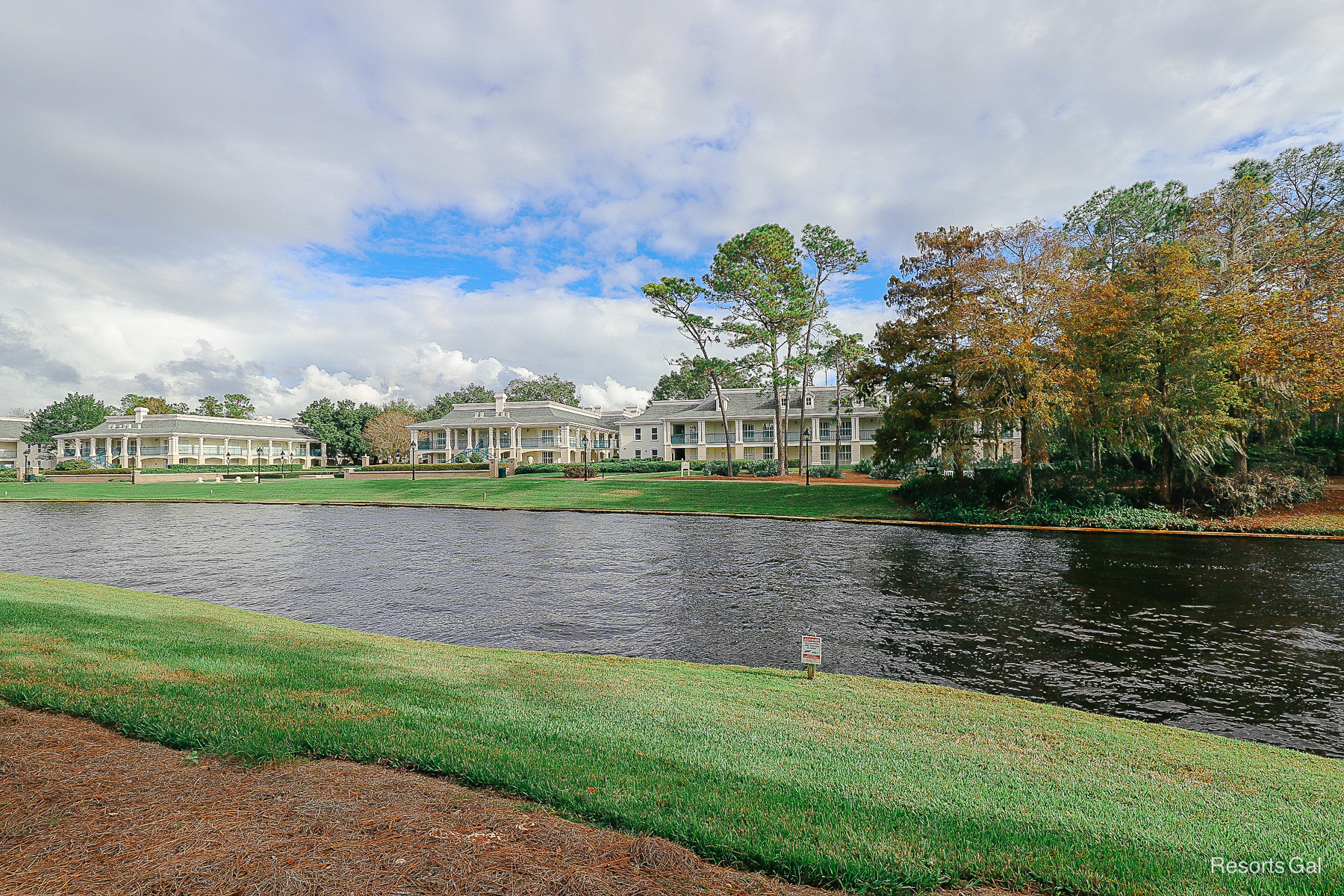 the Sassagoula River with the white mansions of Magnolia Bend on the opposite side 