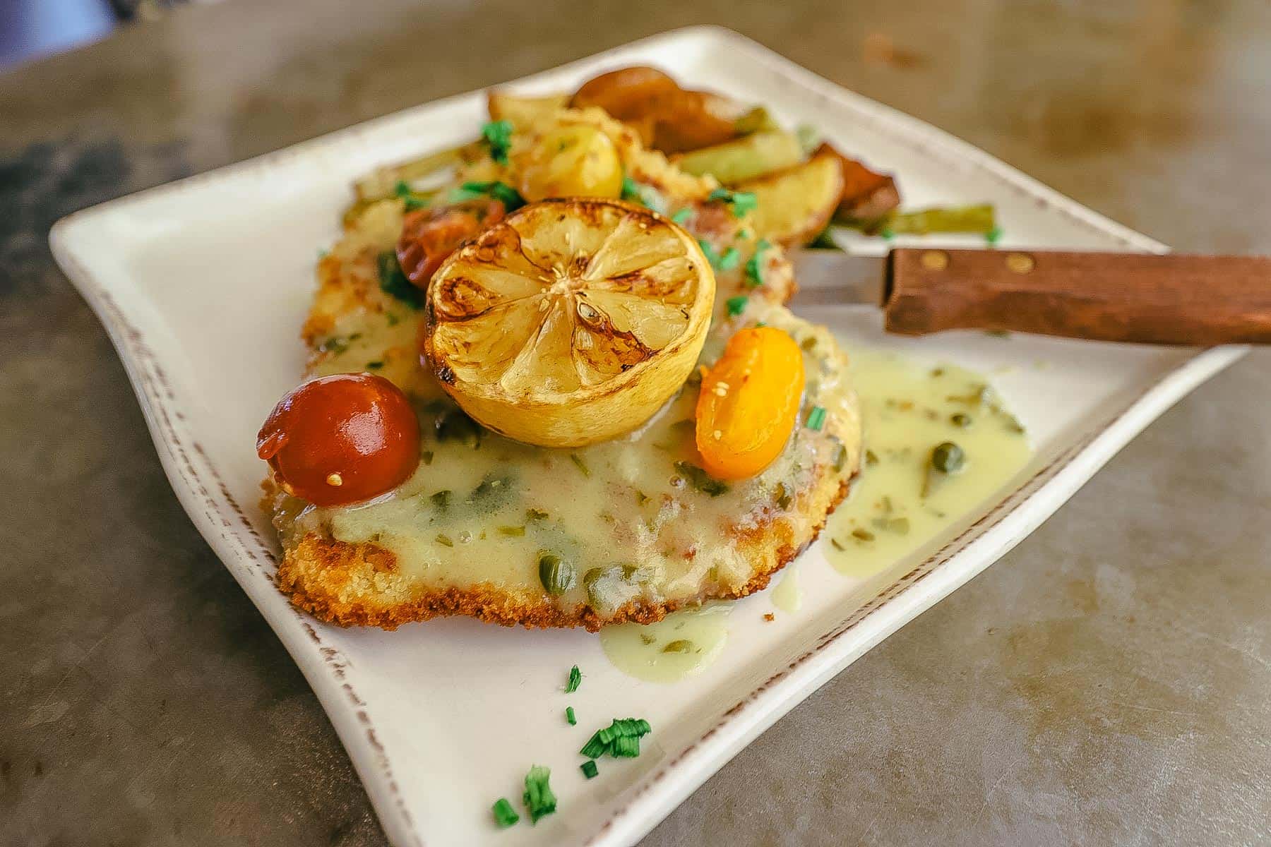 a plate of food from a Disney restaurant 