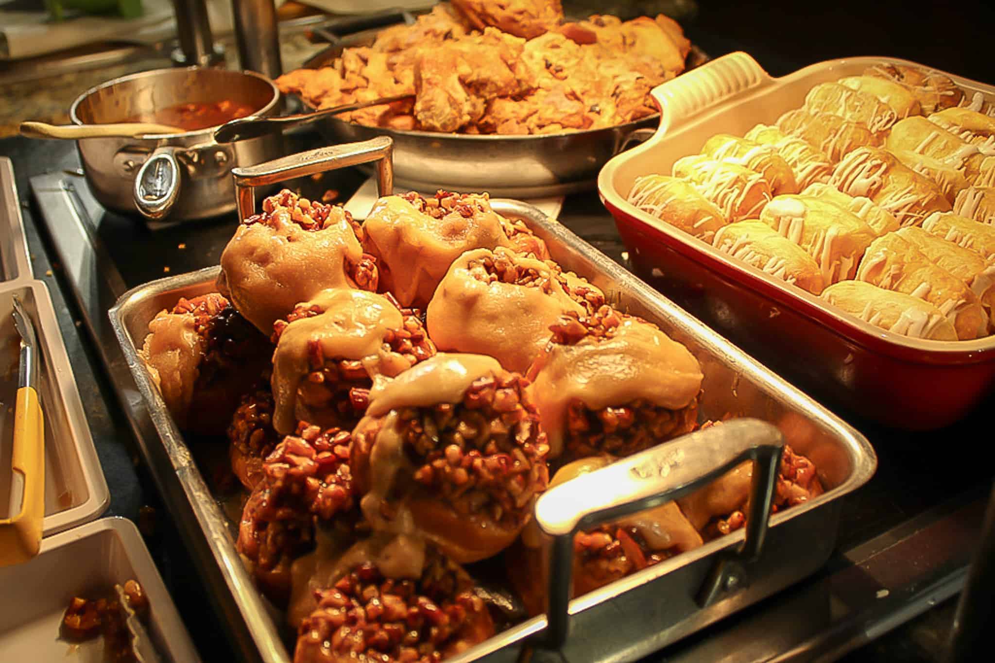 sticky buns and pastries on a breakfast buffet 