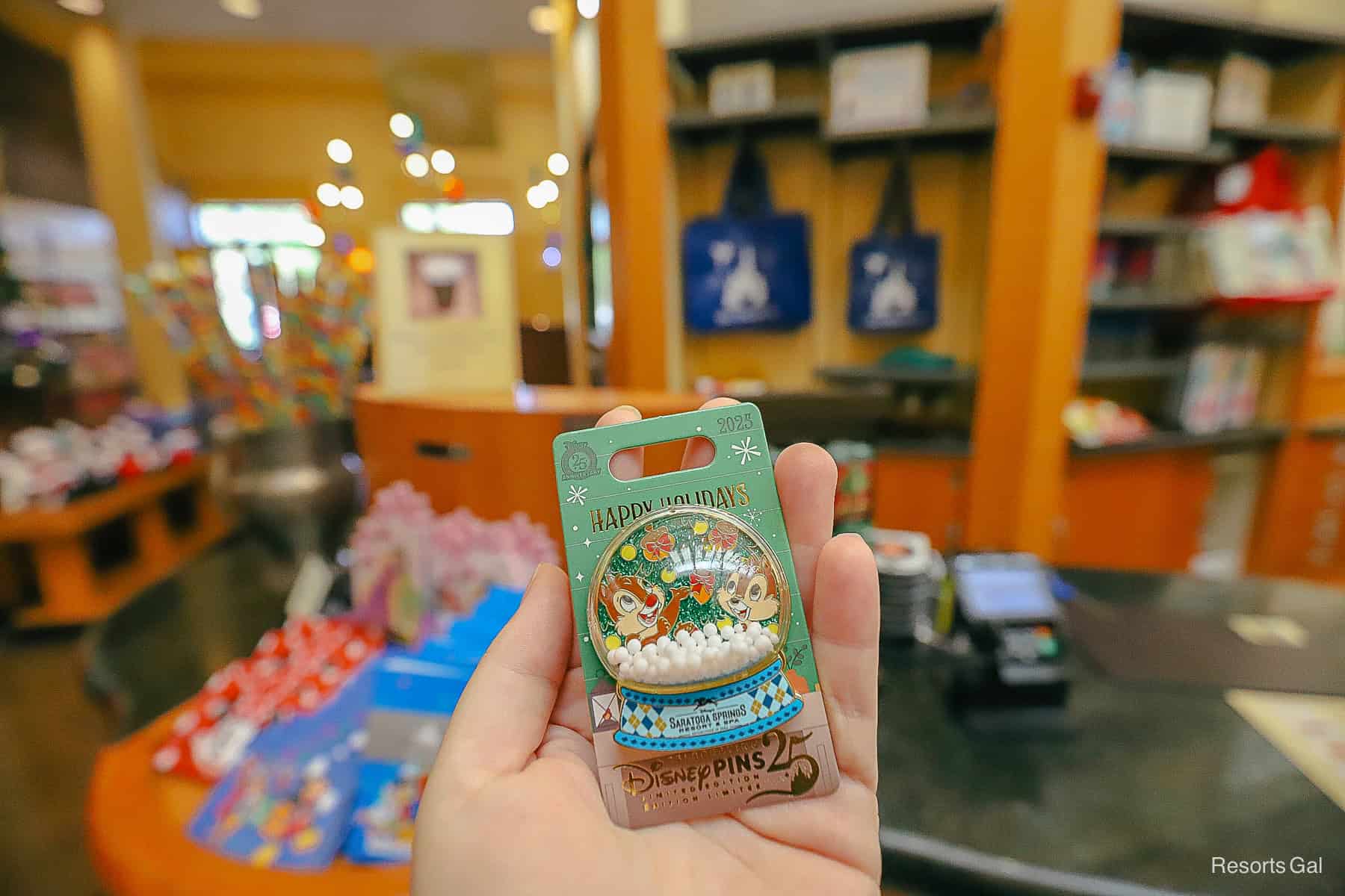 snow globe 2025 resort pin featuring Chip and Dale at Disney Saratoga Springs Resort 