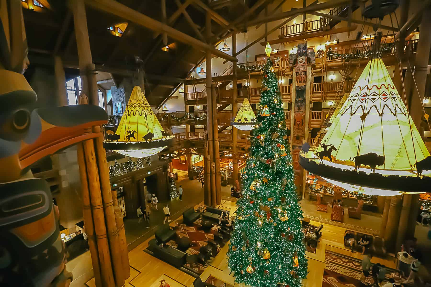 A view of the Christmas tree at Disney's Wilderness Lodge from an upper level. 