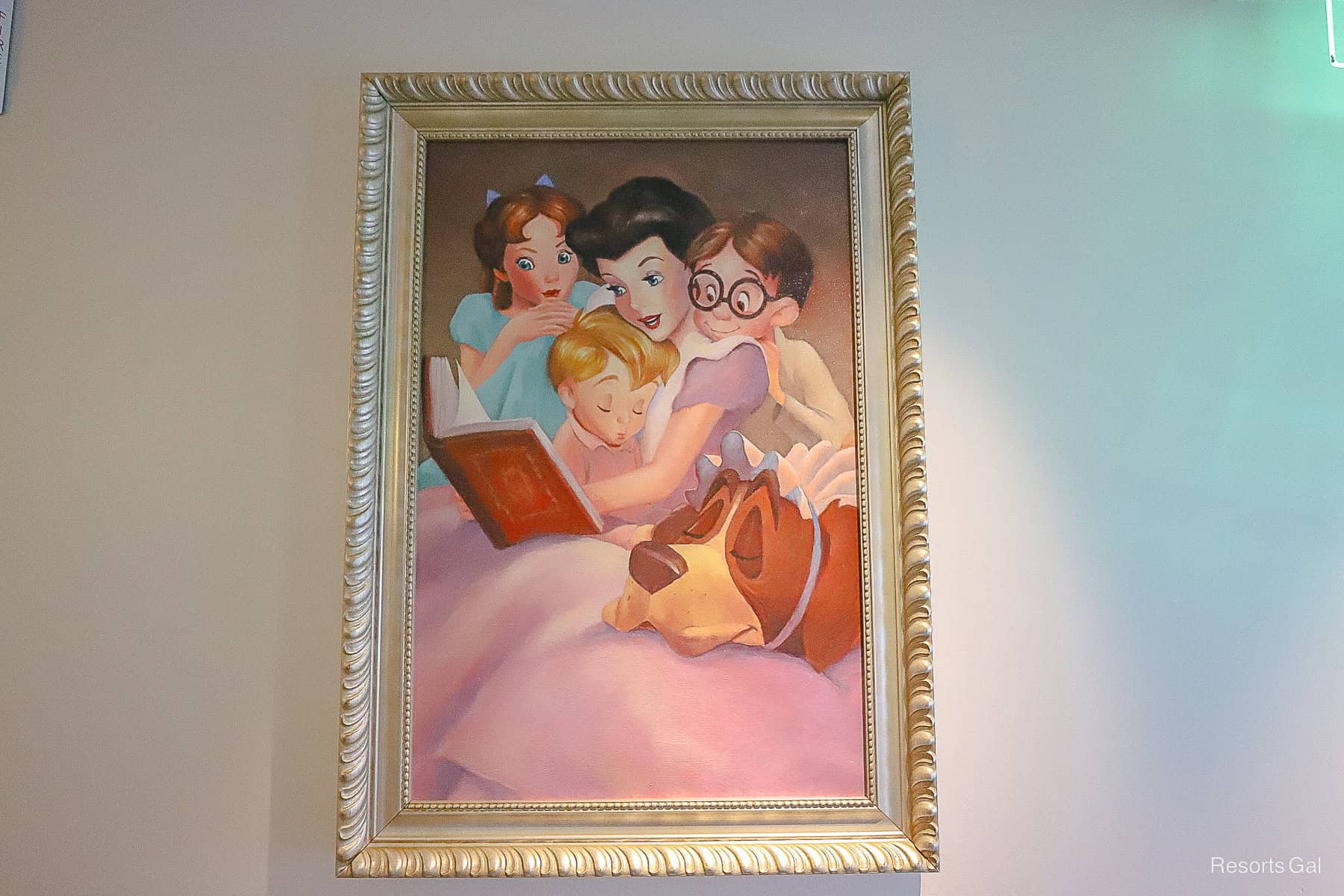 a portrait of Wendy, Jon, and Michael reading a book with Mary Darling and Nana 