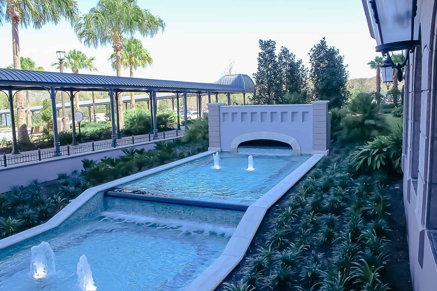 a water feature near the entrance of Disney's Riviera 