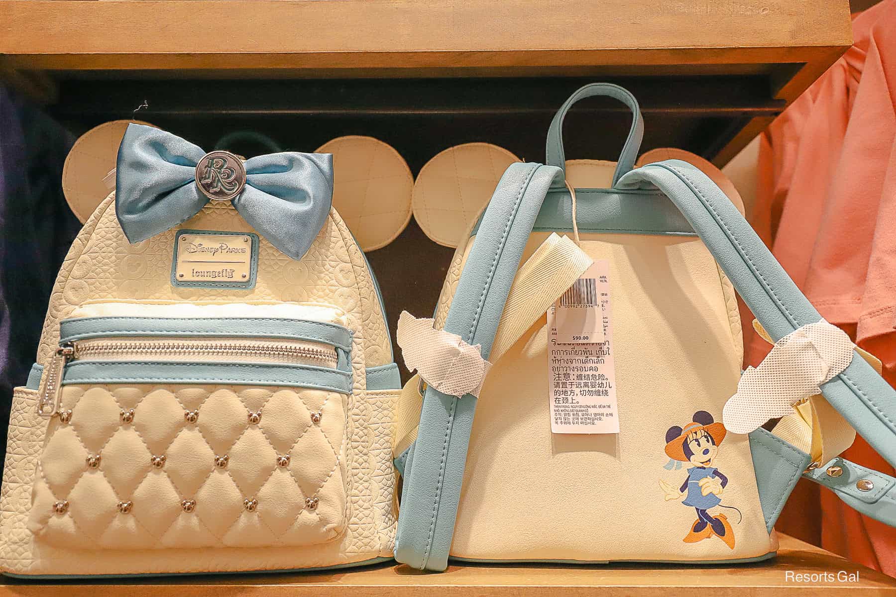 a Disney Loungefly Backpack that represents Disney's Riviera Resort 